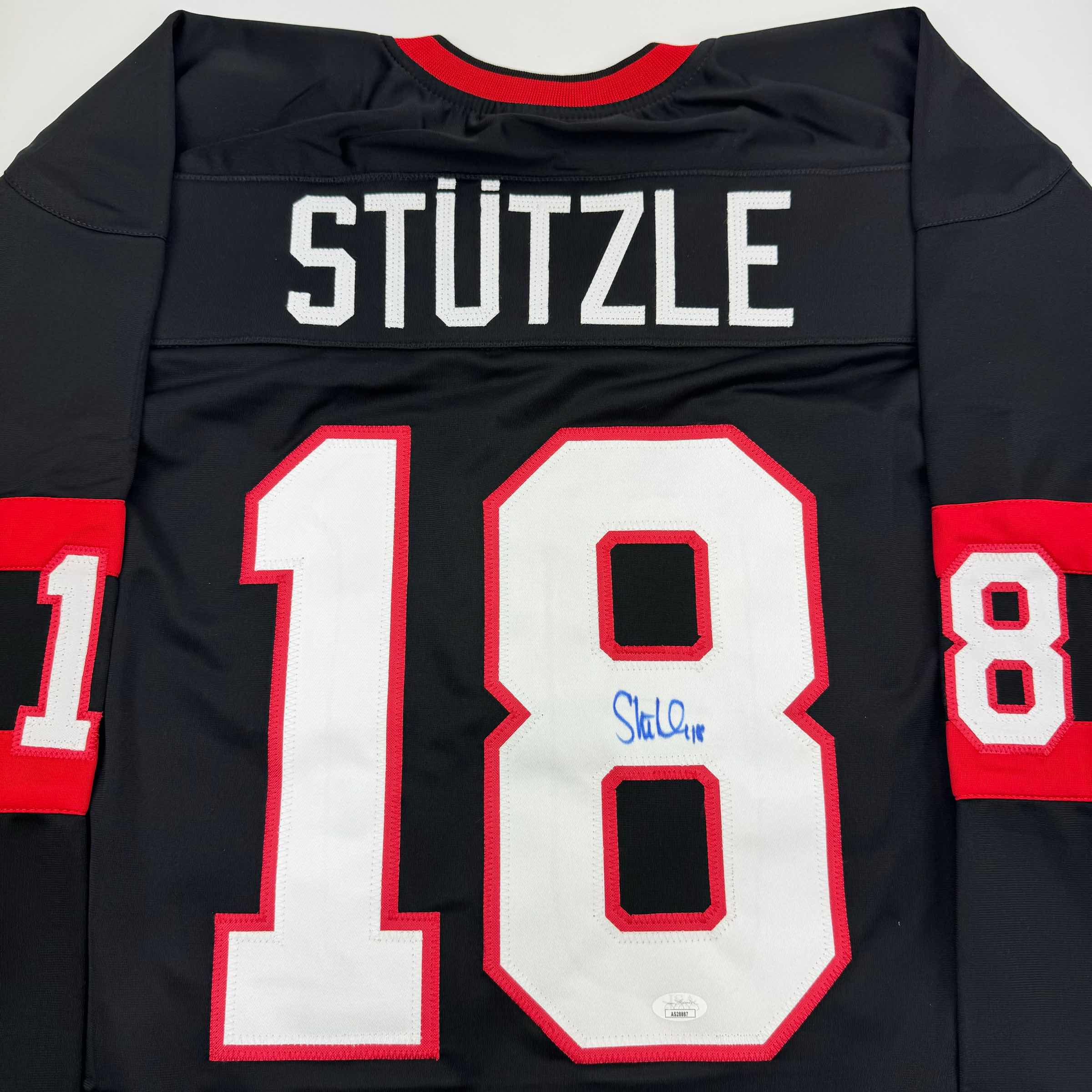 autographed-signed-tim-stutzle-ottawa-black-hockey-jersey-jsa-coa
