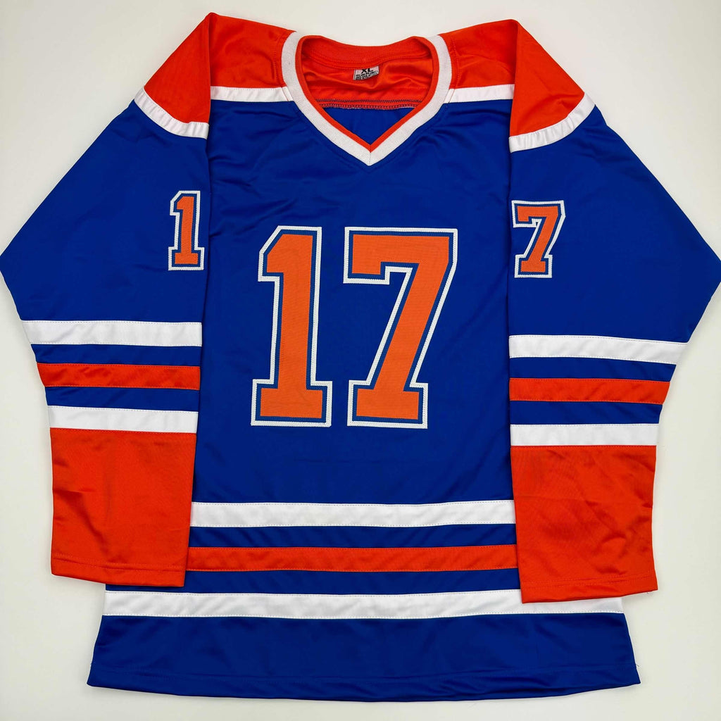 autographed-signed-jari-kurri-edmonton-blue-hockey-jersey-jsa-coa