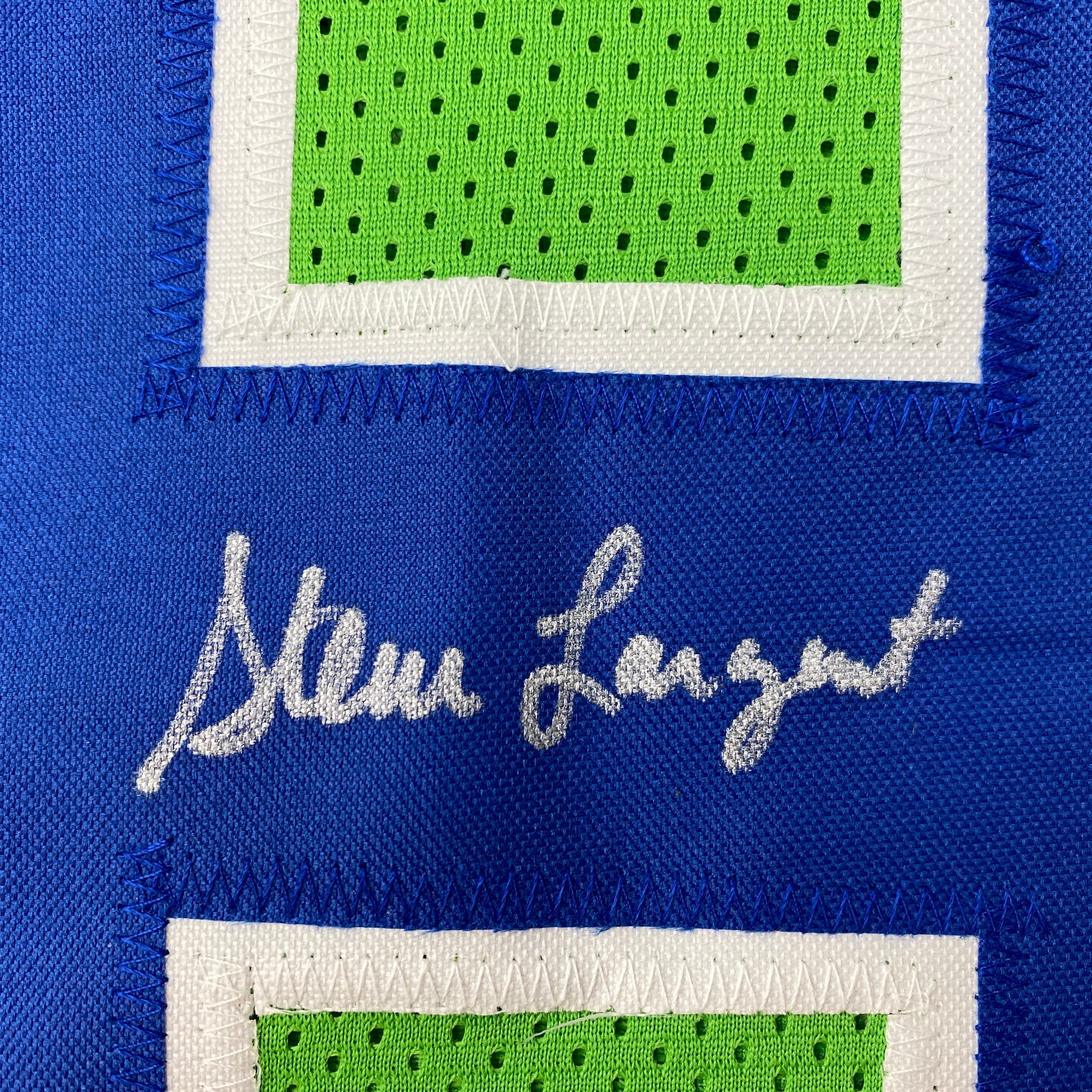 autographed-signed-steve-largent-seattle-green-football-jersey-psa-dna-coa