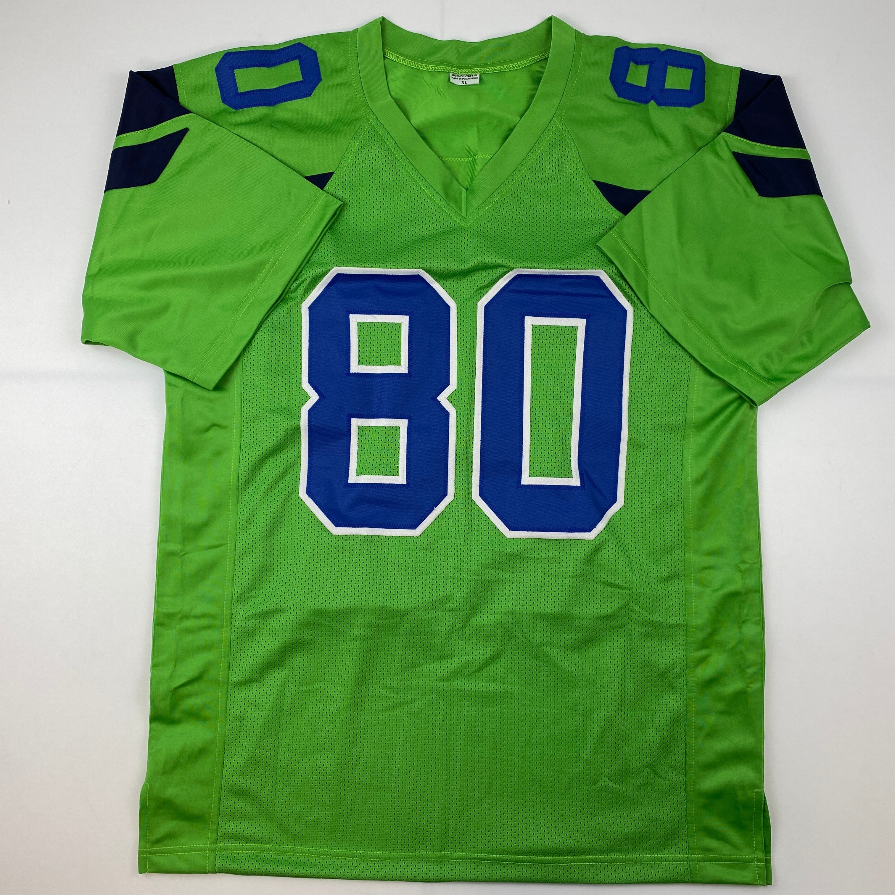 autographed-signed-steve-largent-seattle-green-football-jersey-psa-dna-coa