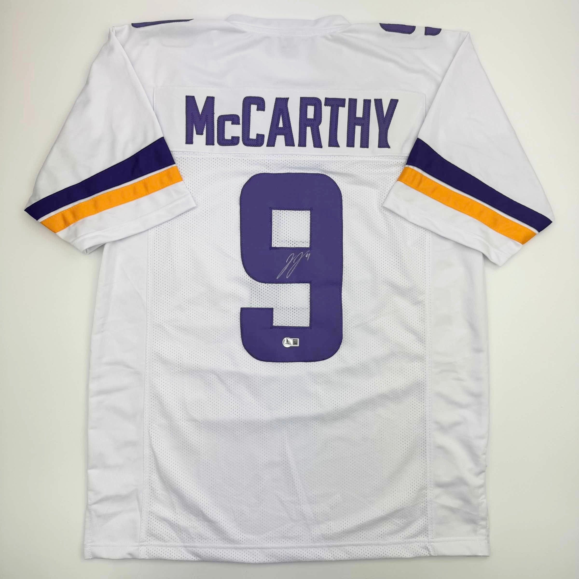 autographed-signed-j-j-jj-mccarthy-minnesota-white-football-jersey-beckett-bas-coa