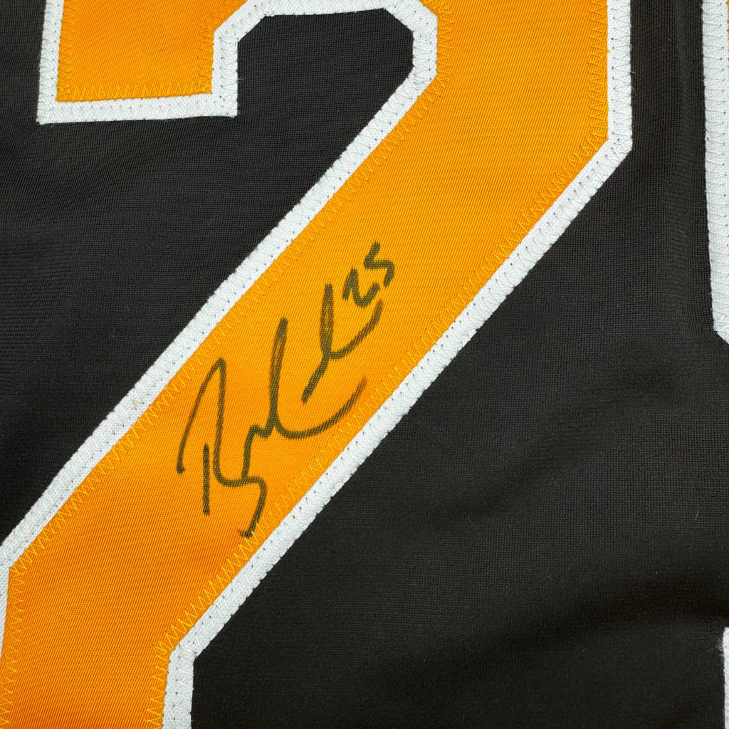 autographed-signed-brandon-carlo-boston-black-hockey-jersey-jsa-coa