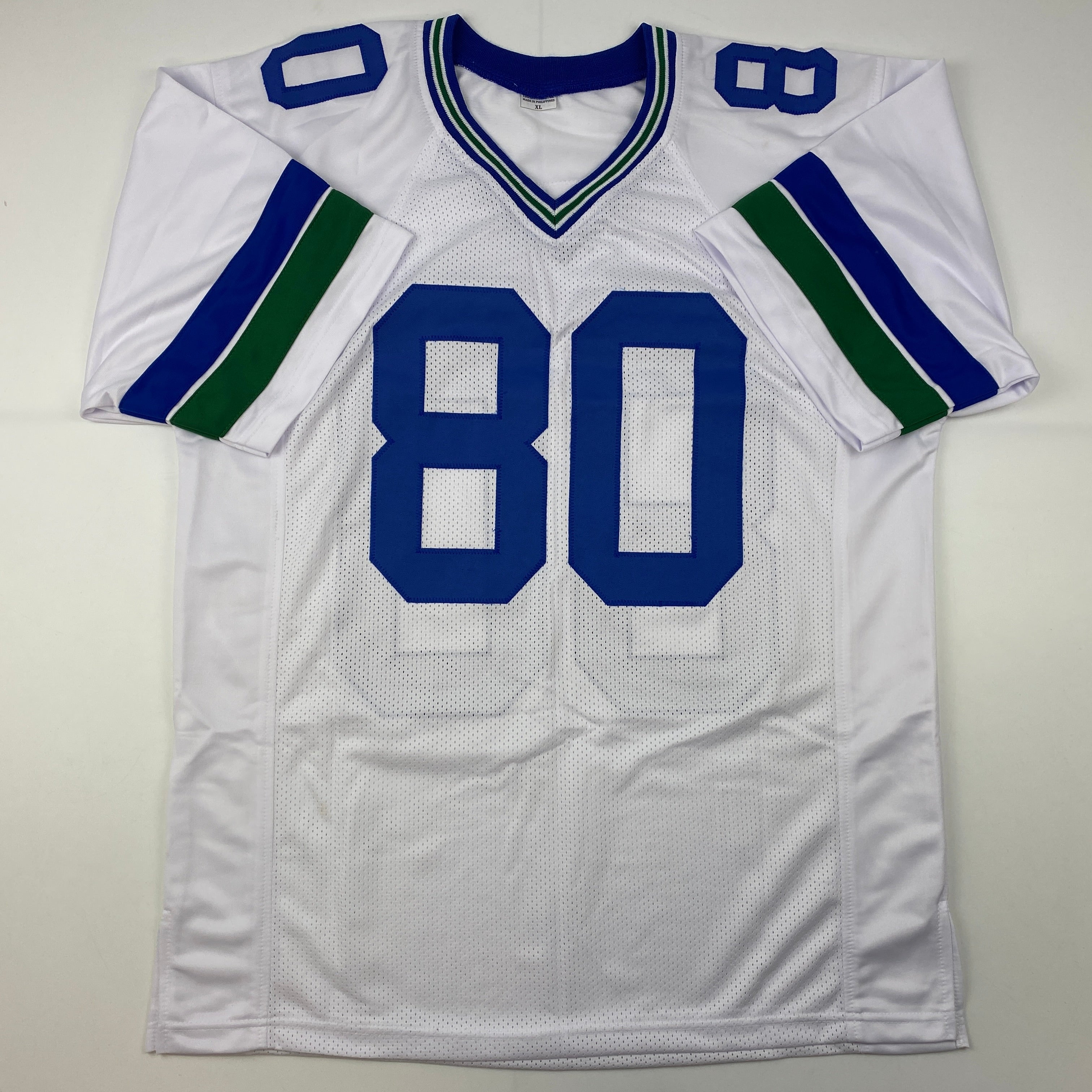 autographed-signed-steve-largent-seattle-white-football-jersey-psa-dna-coa