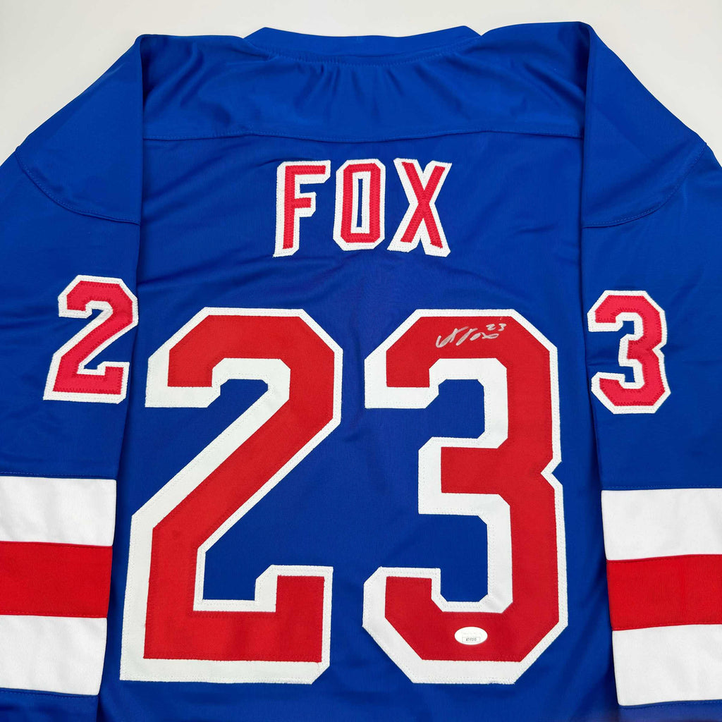 autographed-signed-adam-fox-new-york-blue-hockey-jersey-jsa-coa