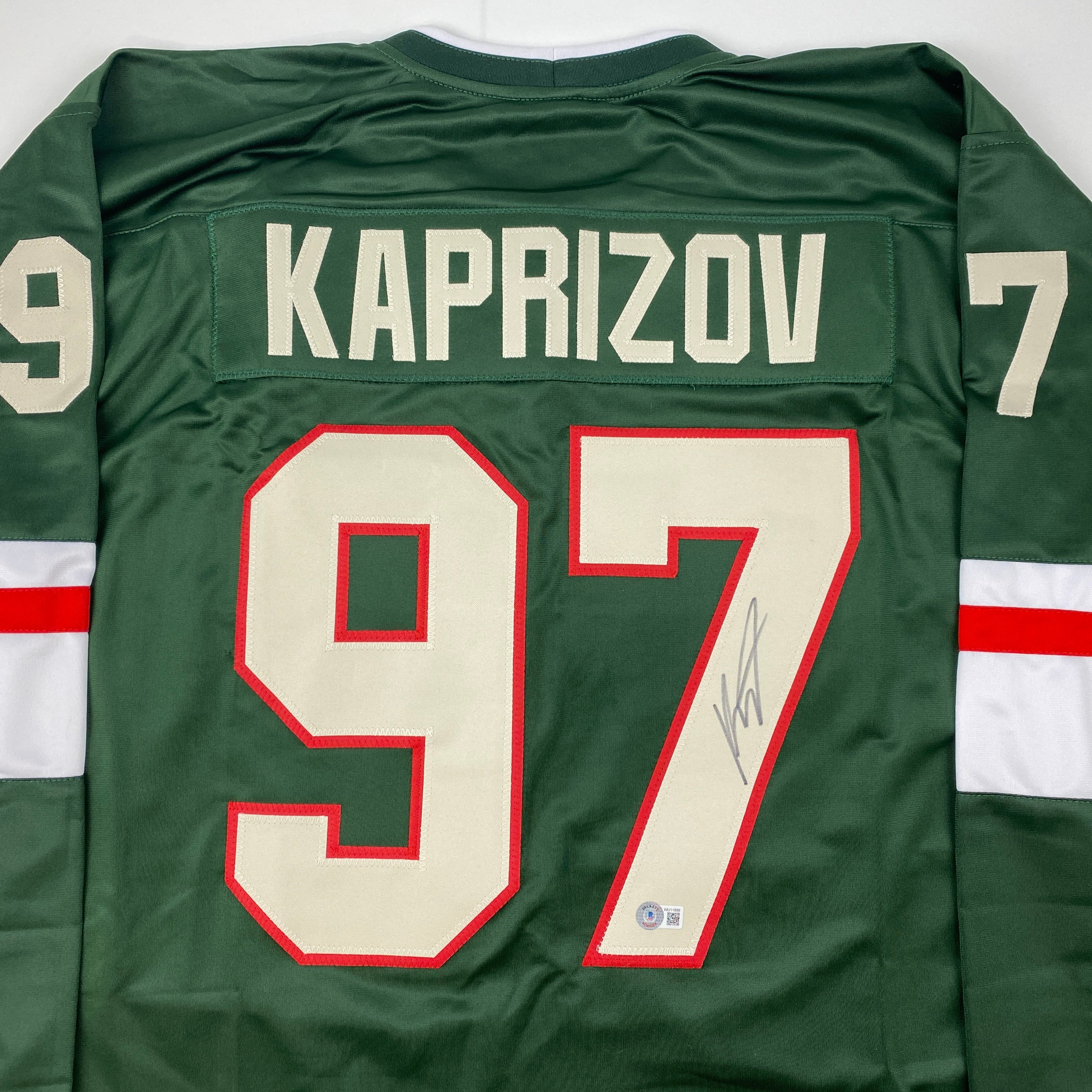 autographed-signed-kirill-kaprizov-minnesota-green-hockey-jersey-beckett-bas-coa