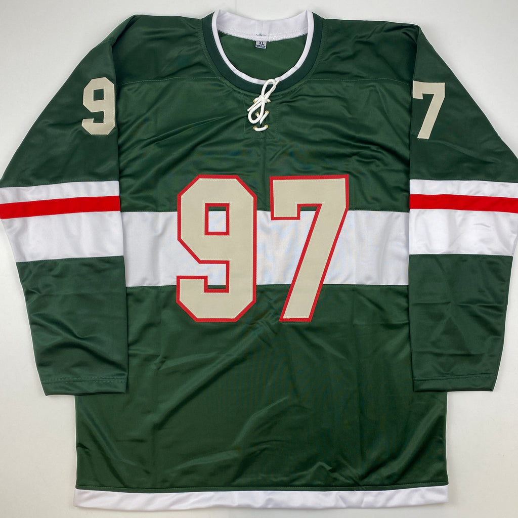 autographed-signed-kirill-kaprizov-minnesota-green-hockey-jersey-beckett-bas-coa
