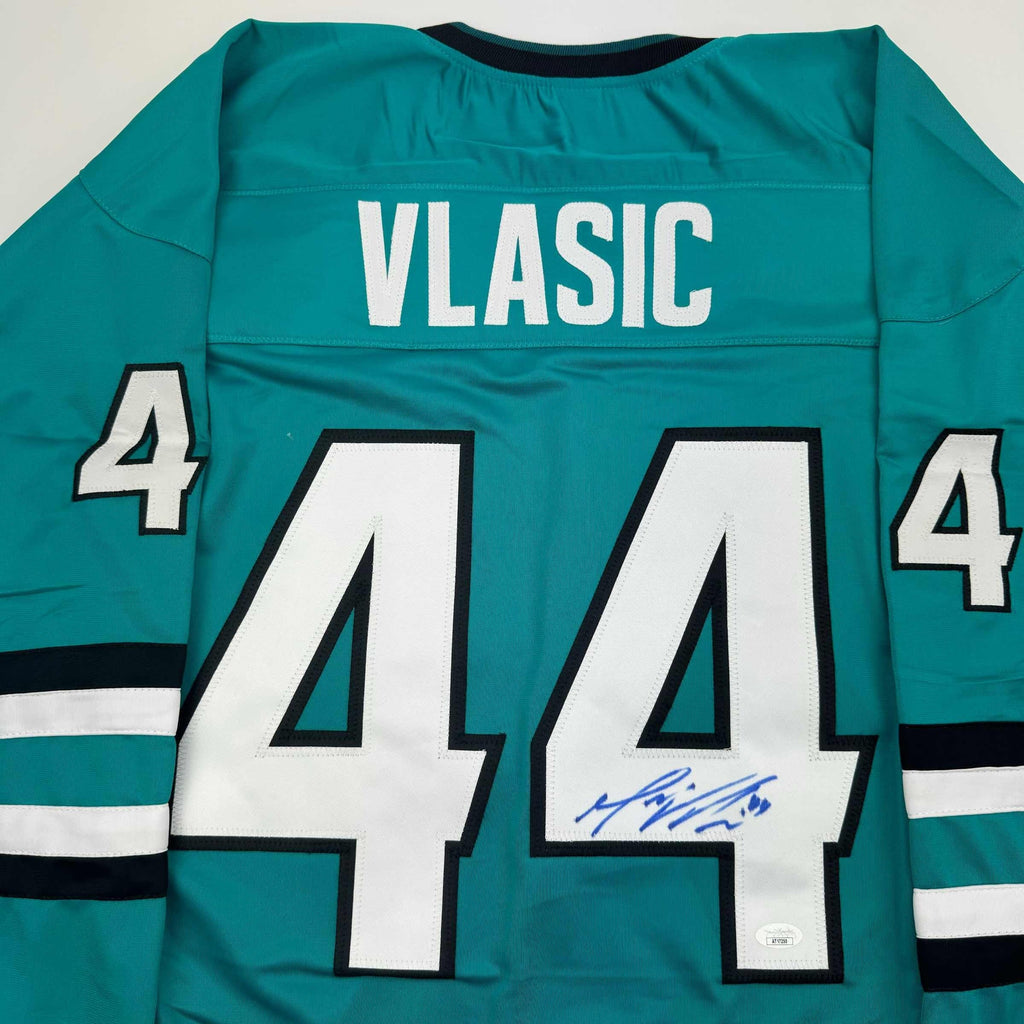 autographed-signed-marc-edouard-vlasic-san-jose-teal-hockey-jersey-jsa-coa
