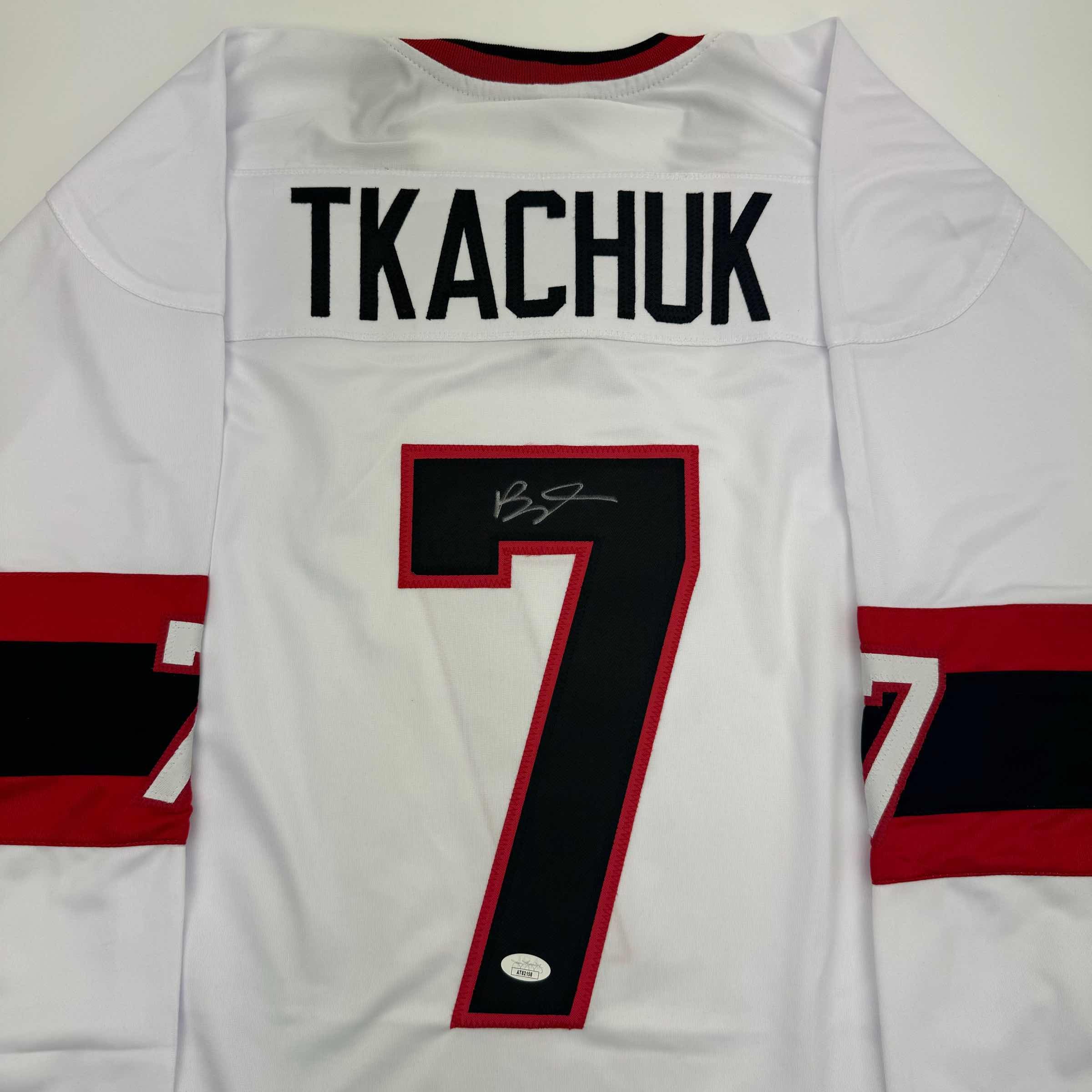 autographed-signed-brady-tkachuk-ottawa-white-hockey-jersey-jsa-coa