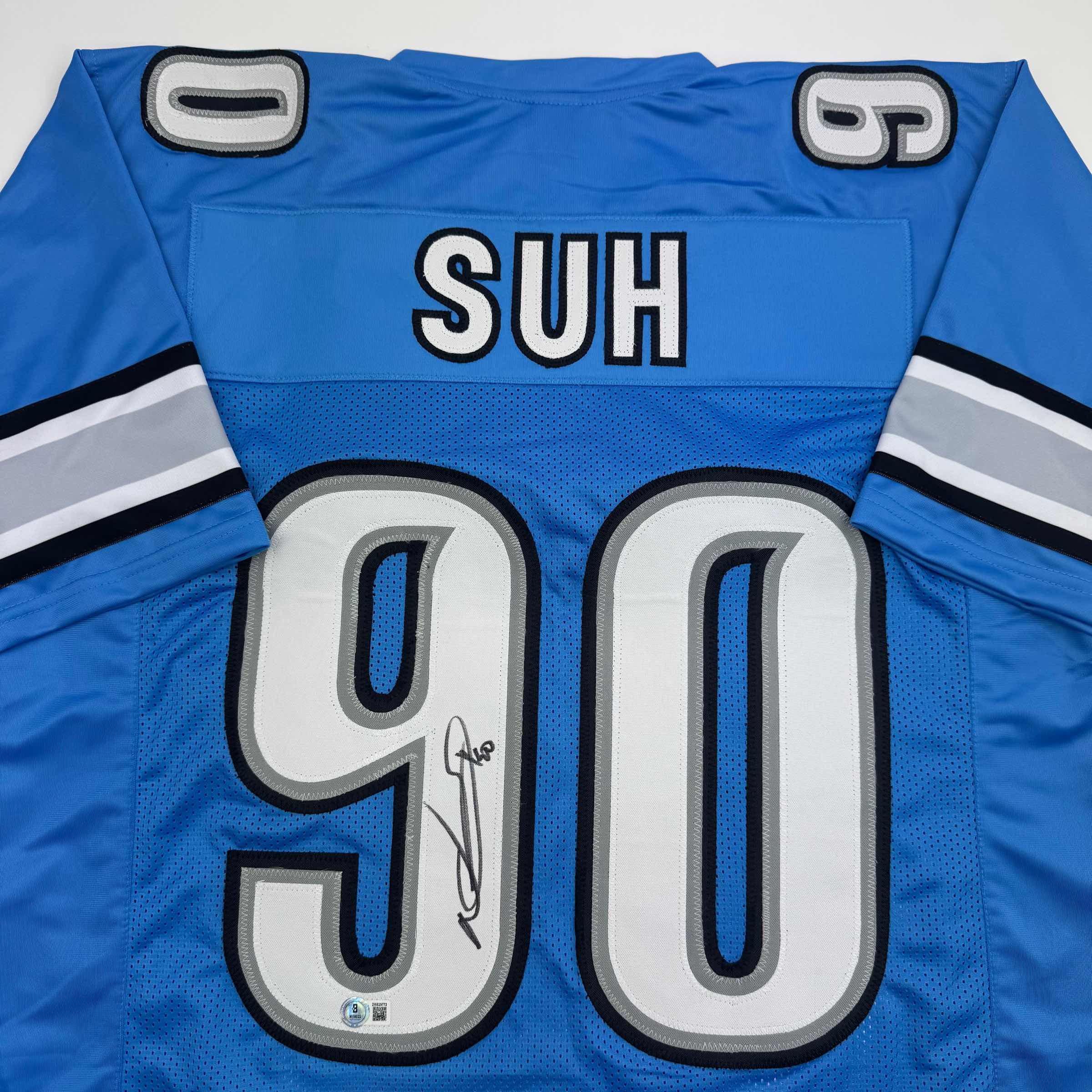 autographed-signed-ndamukong-suh-detroit-blue-football-jersey-beckett-bas-coa