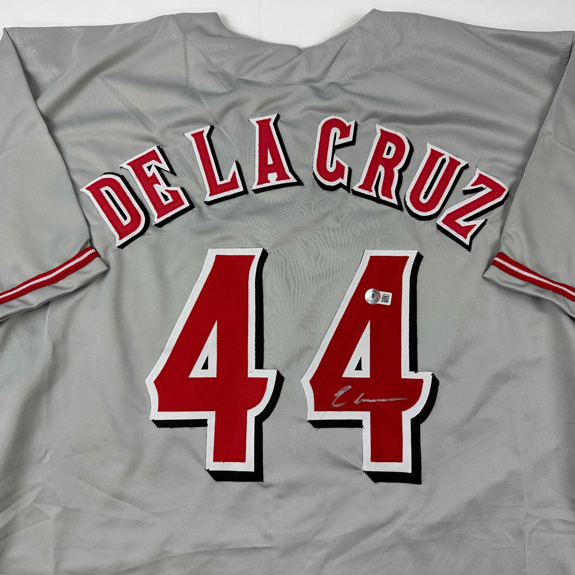 autographed-signed-elly-de-la-cruz-cincinnati-grey-baseball-jersey-beckett-bas-coa