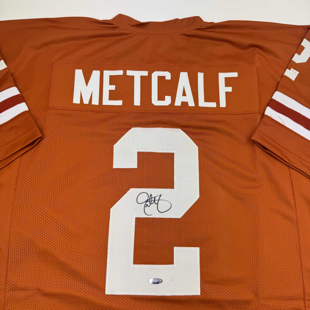 autographed-signed-eric-metcalf-texas-orange-college-football-jersey-beckett-bas-coa