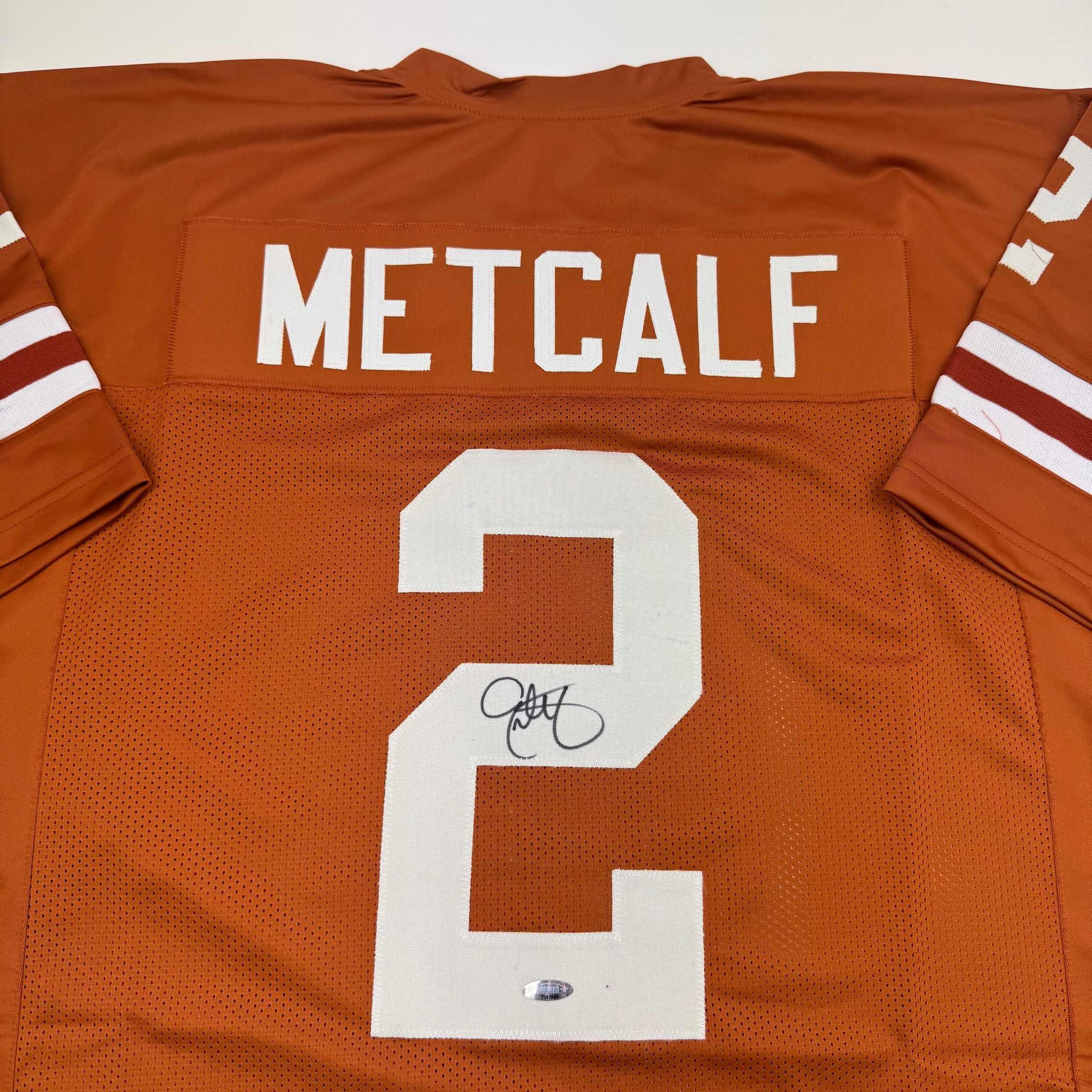 autographed-signed-eric-metcalf-texas-orange-college-football-jersey-beckett-bas-coa
