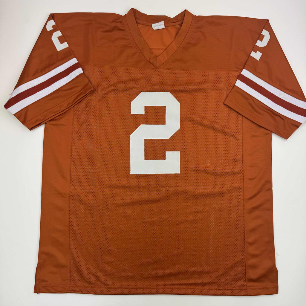 autographed-signed-eric-metcalf-texas-orange-college-football-jersey-beckett-bas-coa