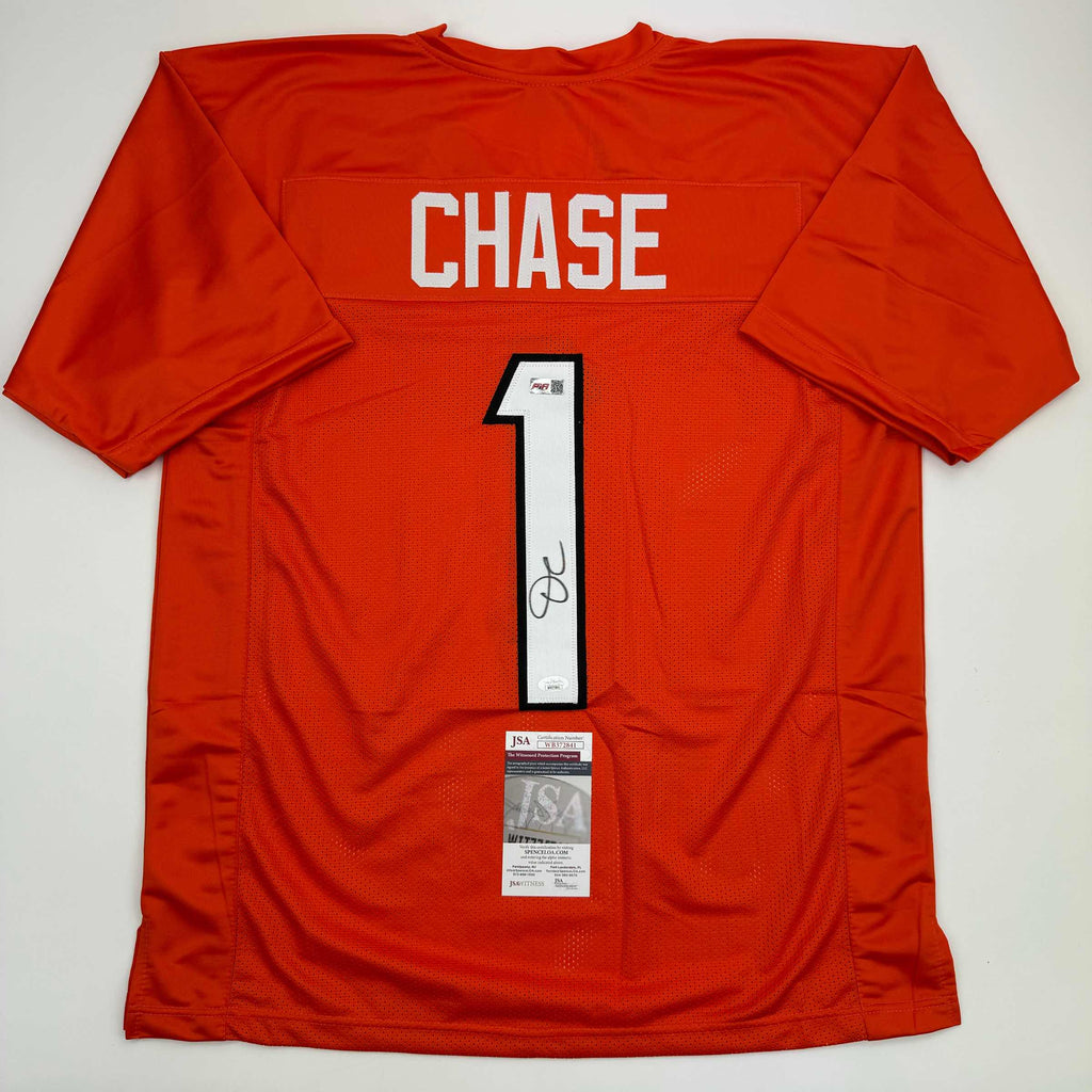 autographed-signed-jamarr-chase-cincinnati-orange-football-jersey-jsa-coa