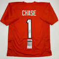 autographed-signed-jamarr-chase-cincinnati-orange-football-jersey-jsa-coa