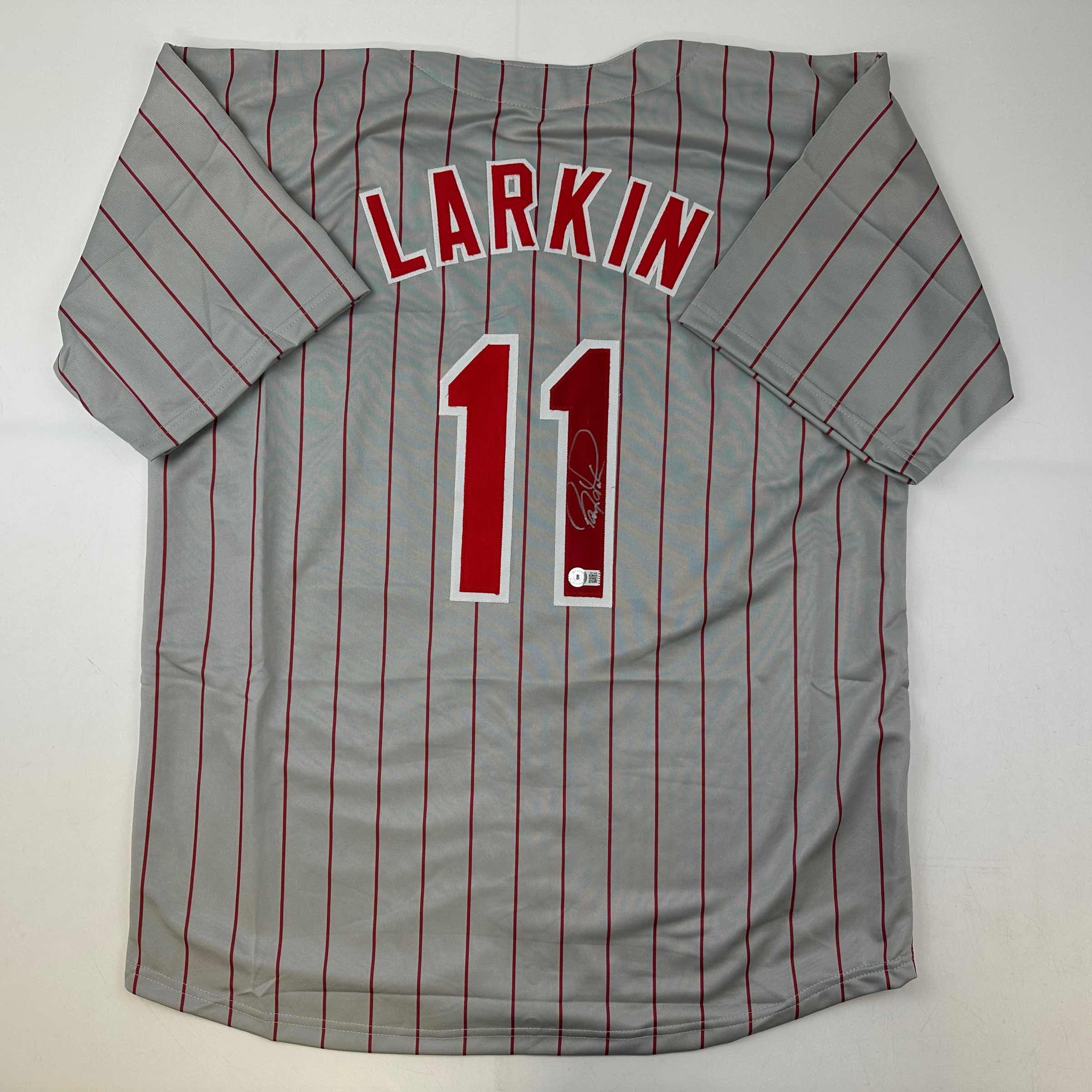 autographed-signed-barry-larkin-cincinnati-grey-pinstripe-baseball-jersey-beckett-bas-coa