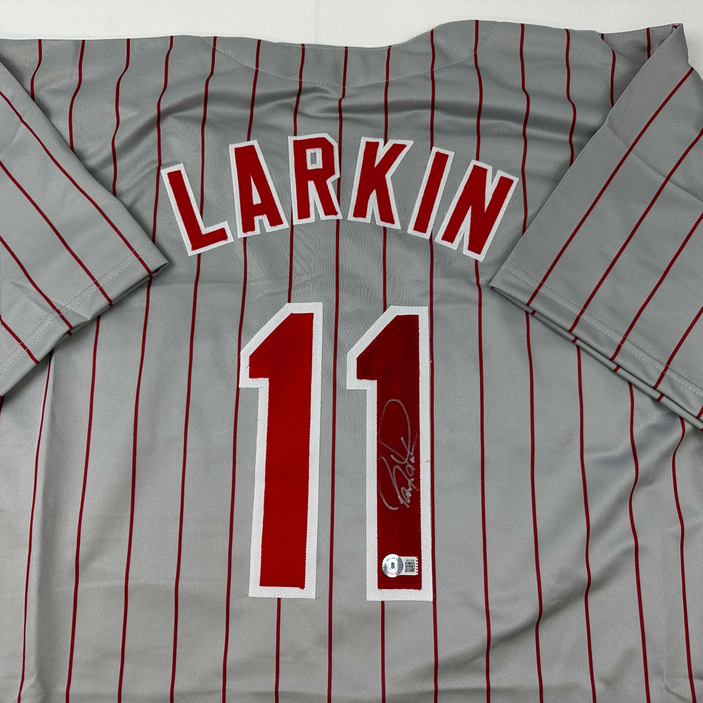 autographed-signed-barry-larkin-cincinnati-grey-pinstripe-baseball-jersey-beckett-bas-coa