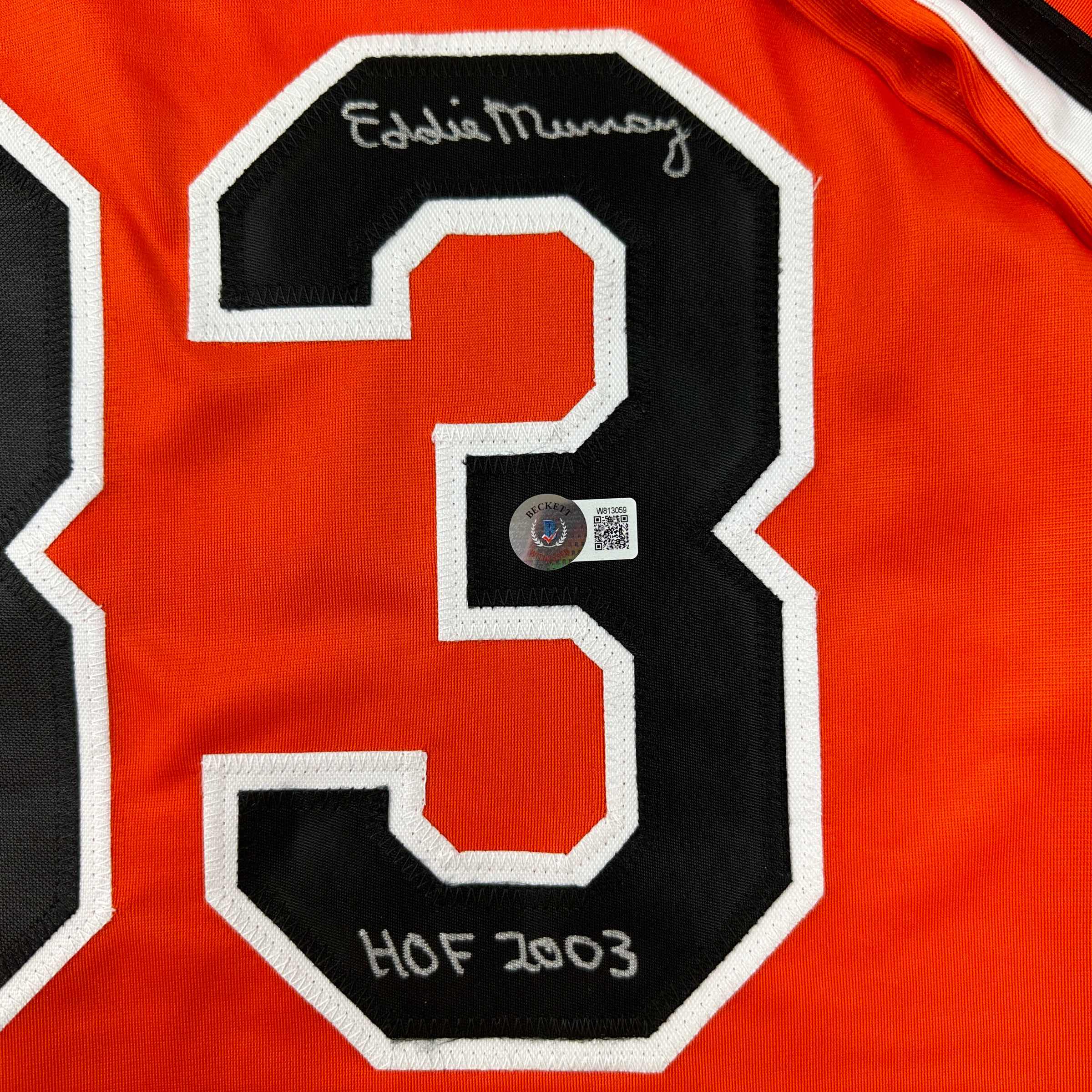 autographed-signed-eddie-murray-baltimore-orange-baseball-jersey-beckett-bas-coa