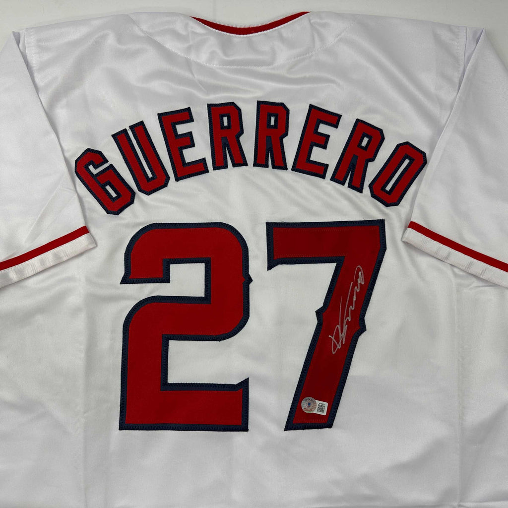 autographed-signed-vladimir-vlad-guerrero-los-angeles-la-anaheim-white-baseball-jersey-beckett-bas-coa