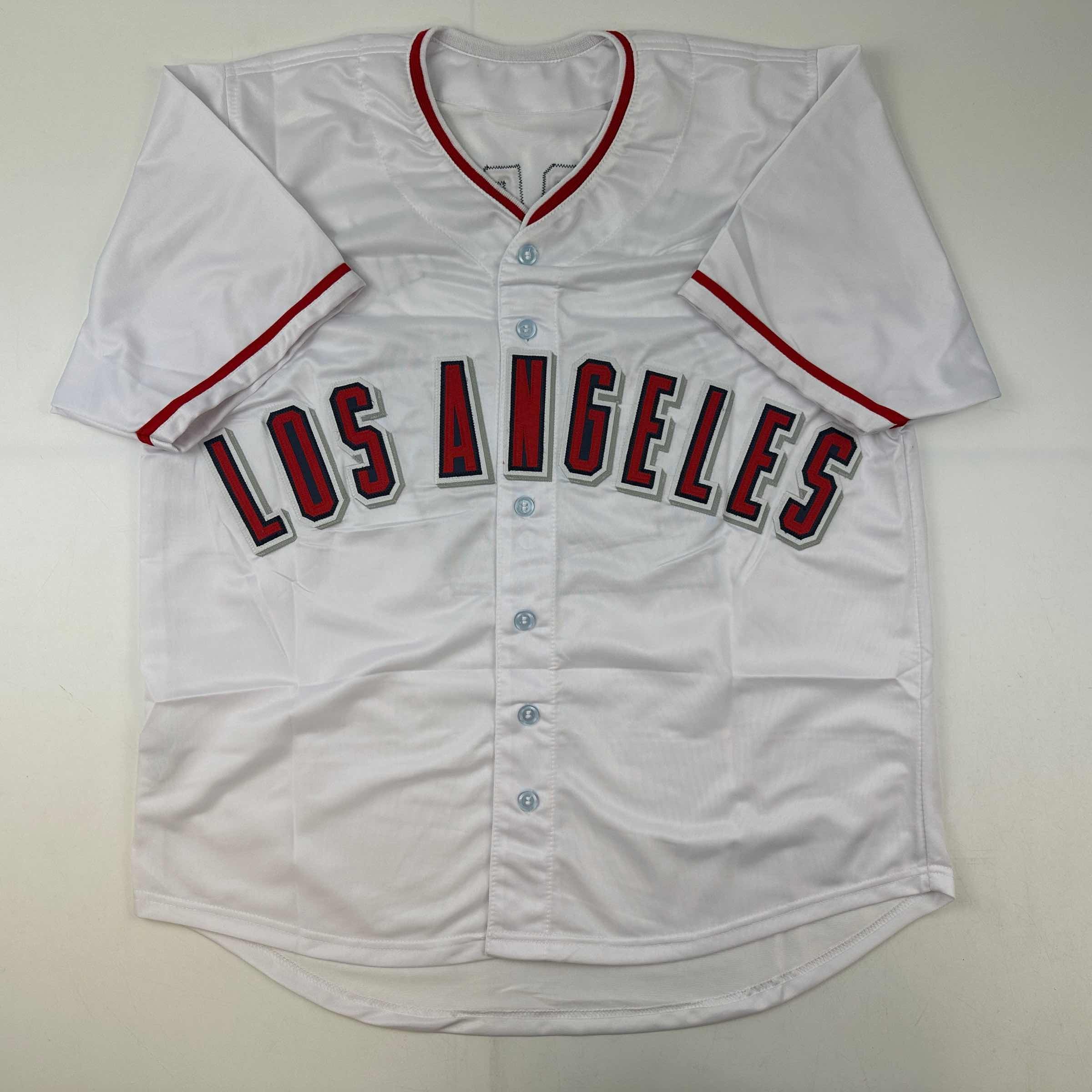 autographed-signed-vladimir-vlad-guerrero-los-angeles-la-anaheim-white-baseball-jersey-beckett-bas-coa