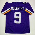 autographed-signed-j-j-jj-mccarthy-minnesota-purple-football-jersey-beckett-bas-coa