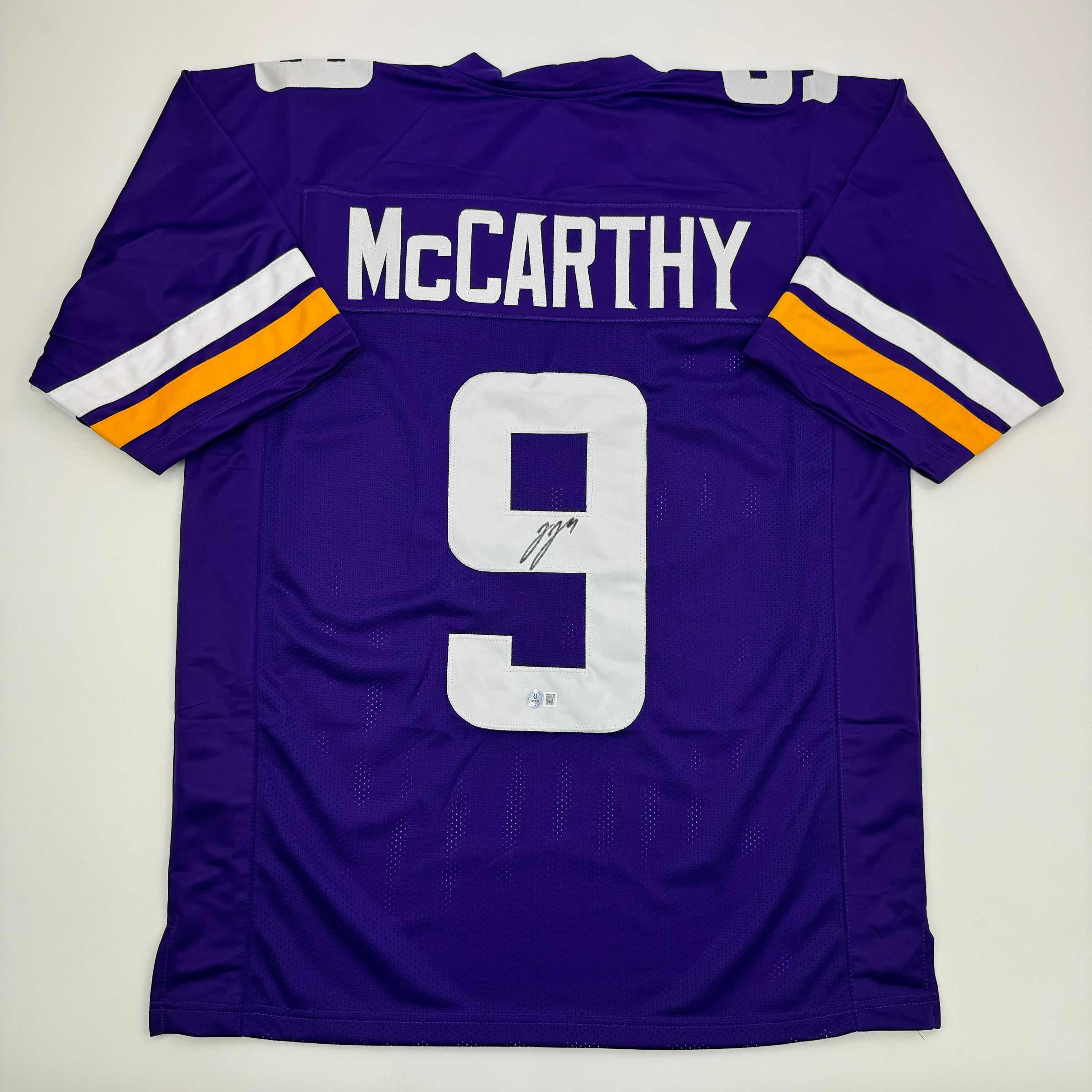 autographed-signed-j-j-jj-mccarthy-minnesota-purple-football-jersey-beckett-bas-coa