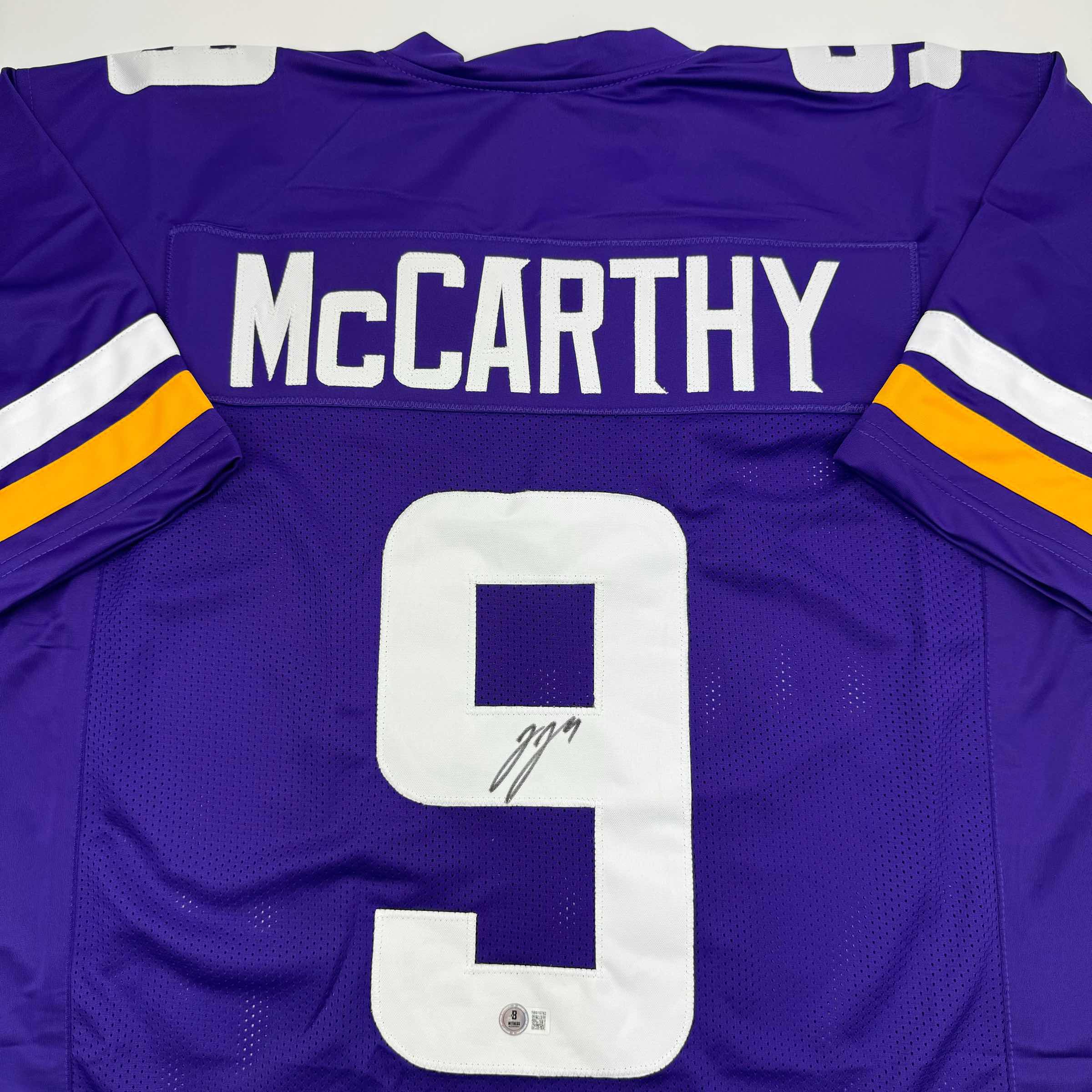 autographed-signed-j-j-jj-mccarthy-minnesota-purple-football-jersey-beckett-bas-coa