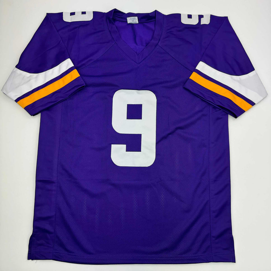autographed-signed-j-j-jj-mccarthy-minnesota-purple-football-jersey-beckett-bas-coa