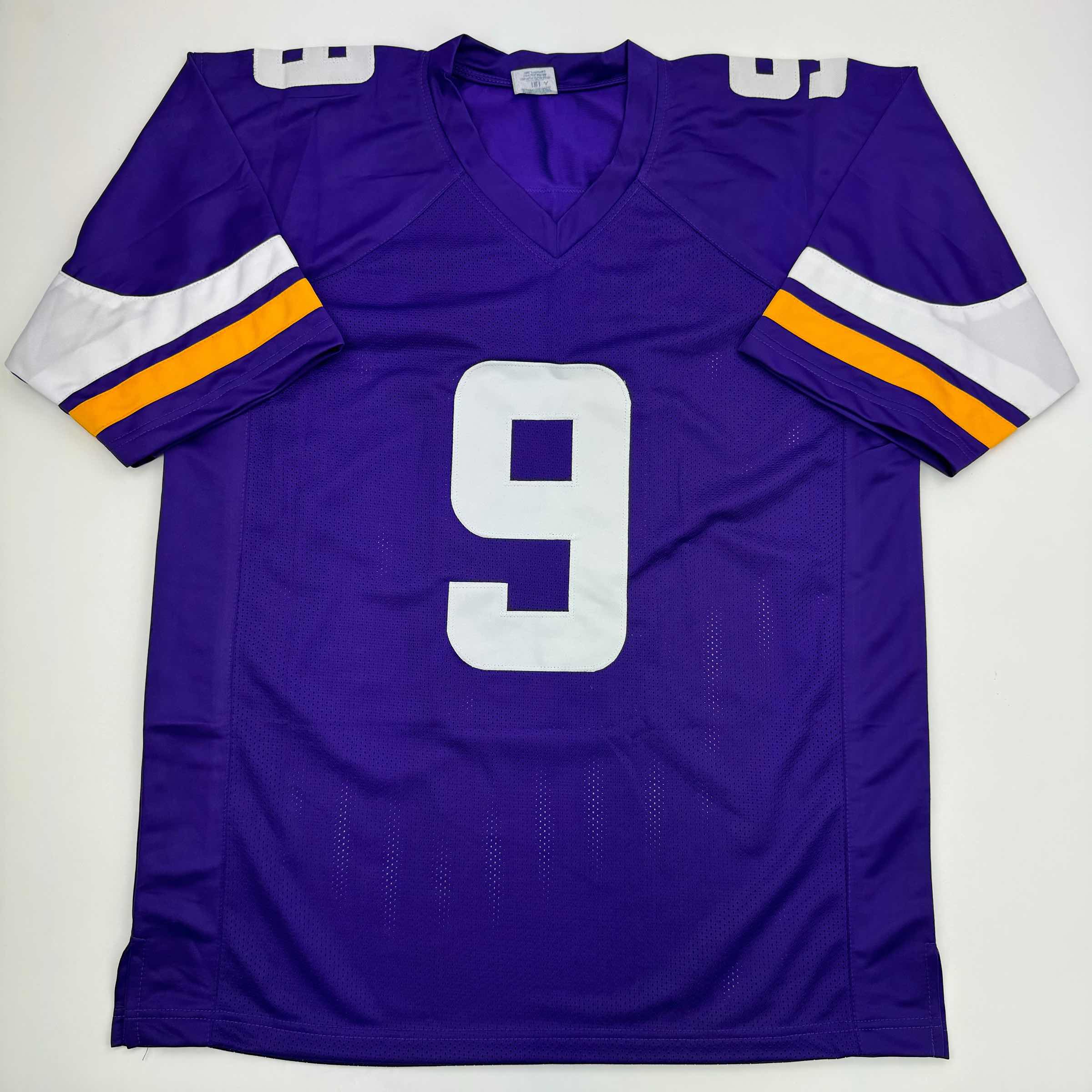 autographed-signed-j-j-jj-mccarthy-minnesota-purple-football-jersey-beckett-bas-coa