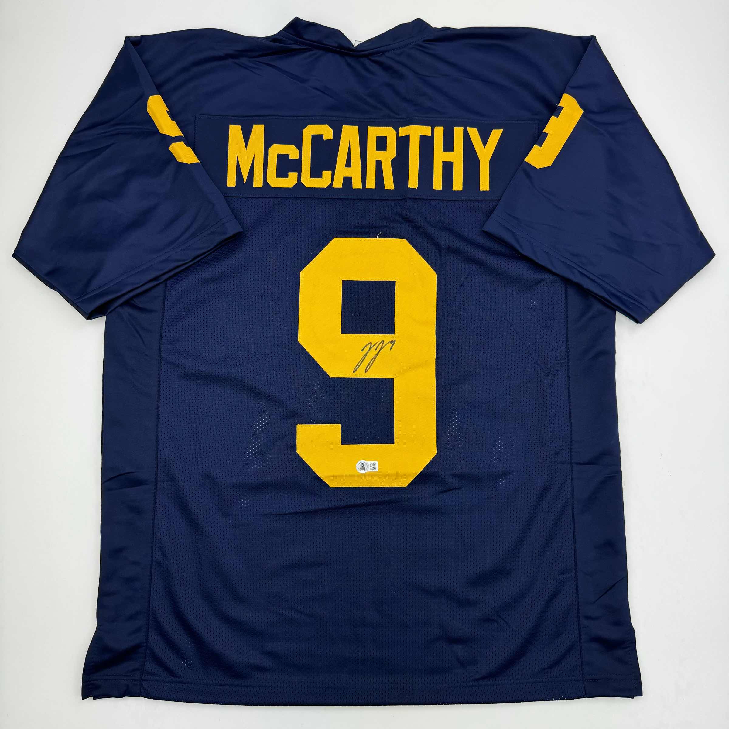 autographed-signed-j-j-jj-mccarthy-michigan-blue-college-football-jersey-beckett-bas-coa
