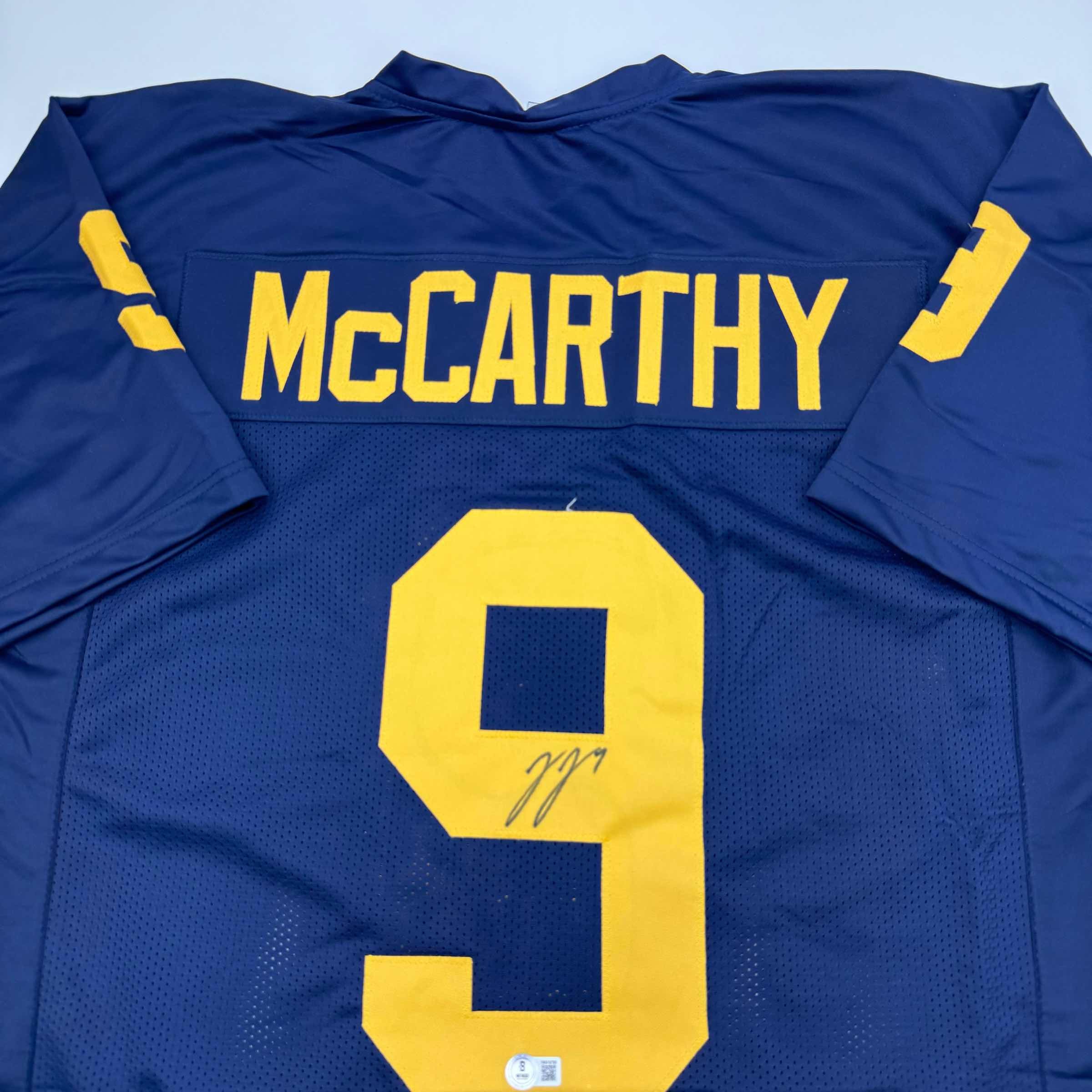 autographed-signed-j-j-jj-mccarthy-michigan-blue-college-football-jersey-beckett-bas-coa