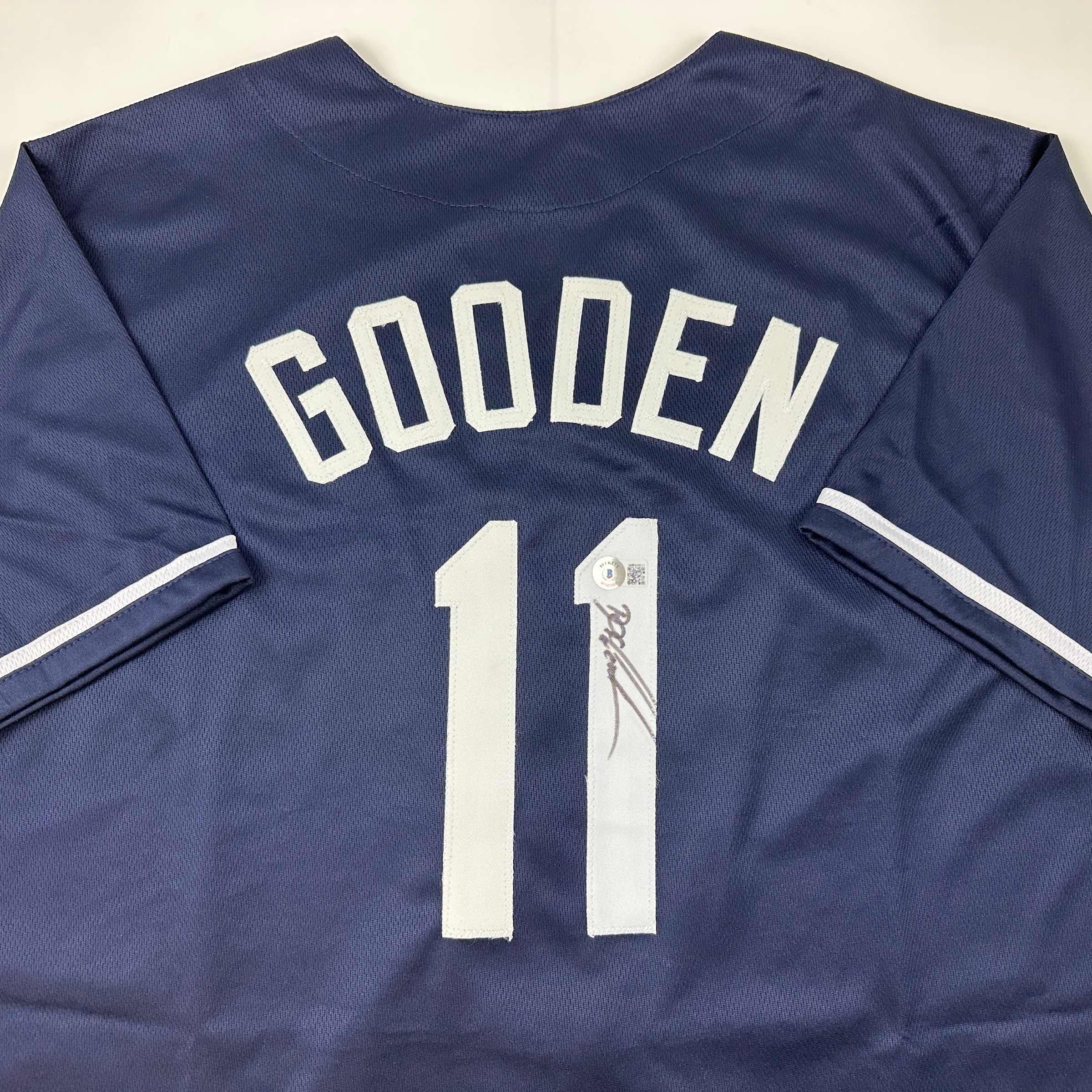 autographed-signed-dwight-doc-gooden-new-york-blue-baseball-jersey-beckett-bas-coa