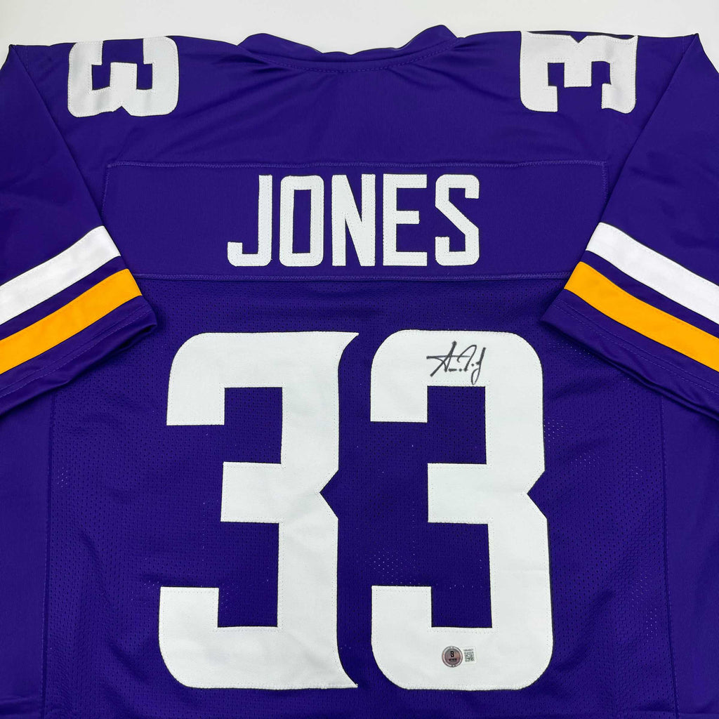 autographed-signed-aaron-jones-minnesota-purple-football-jersey-beckett-bas-coa