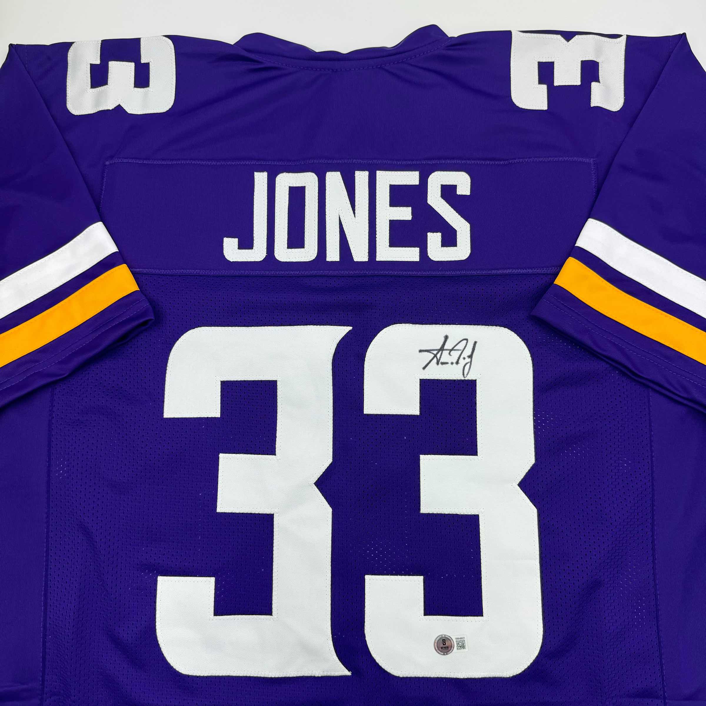 autographed-signed-aaron-jones-minnesota-purple-football-jersey-beckett-bas-coa