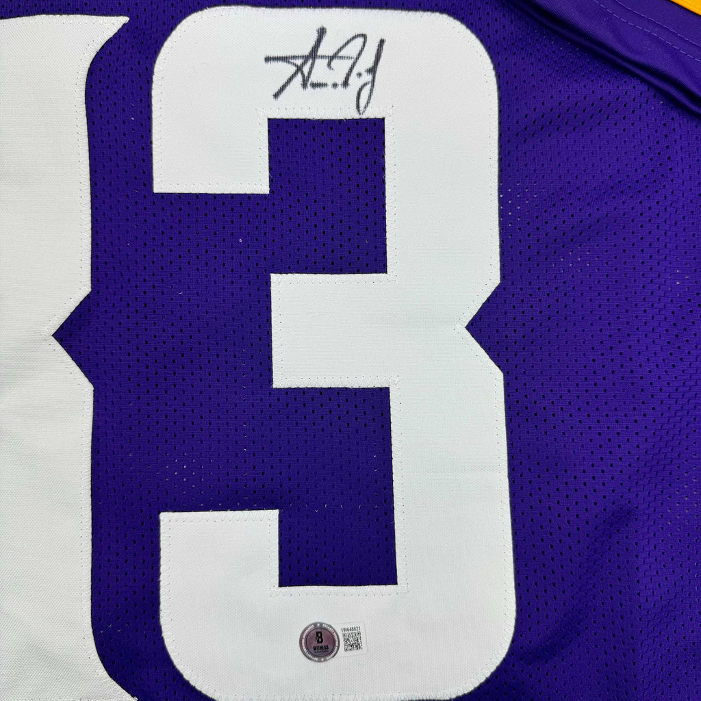 autographed-signed-aaron-jones-minnesota-purple-football-jersey-beckett-bas-coa
