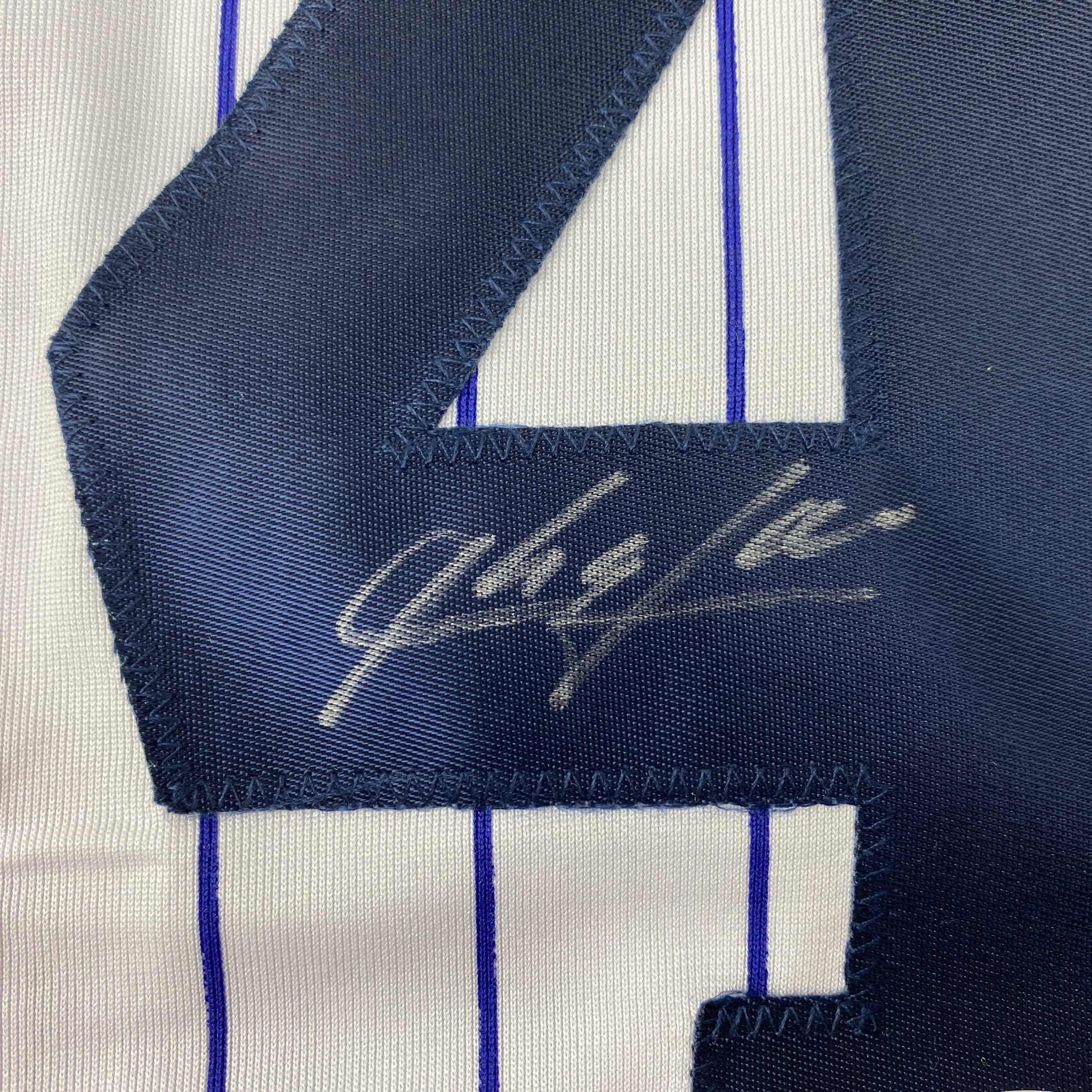 autographed-signed-aroldis-chapman-new-york-pinstripe-baseball-jersey-beckett-bas-coa
