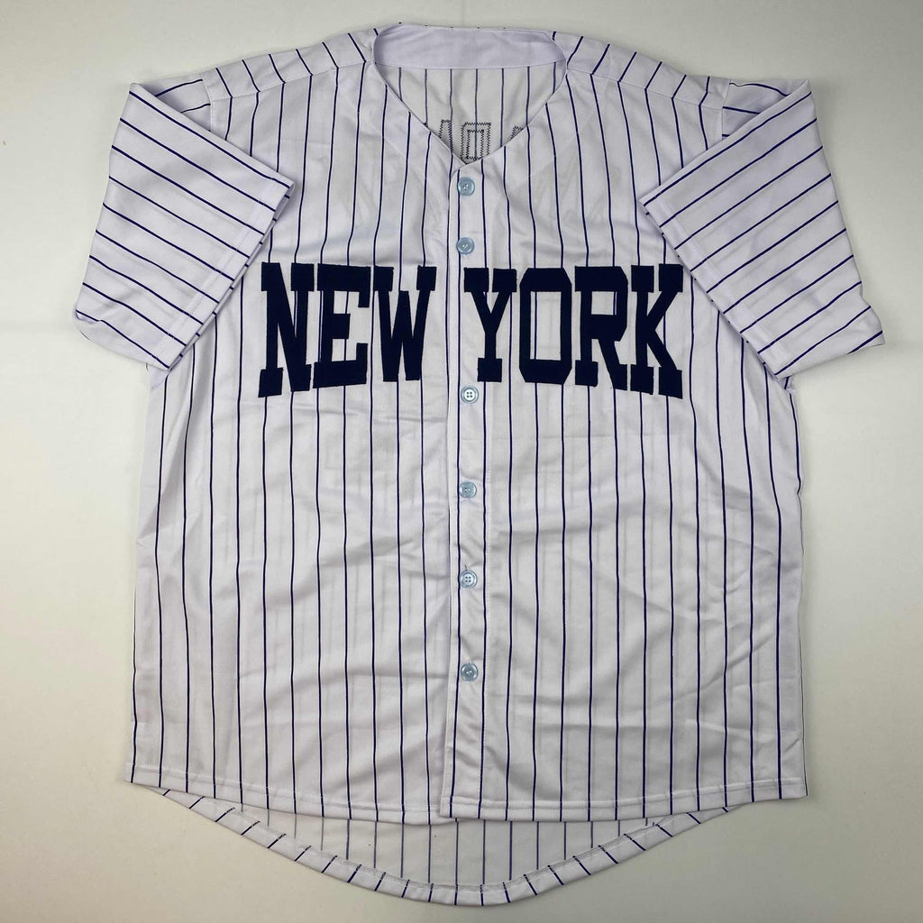 autographed-signed-aroldis-chapman-new-york-pinstripe-baseball-jersey-beckett-bas-coa