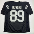 autographed-signed-brock-bowers-las-vegas-oakland-black-football-jersey-beckett-bas-coa