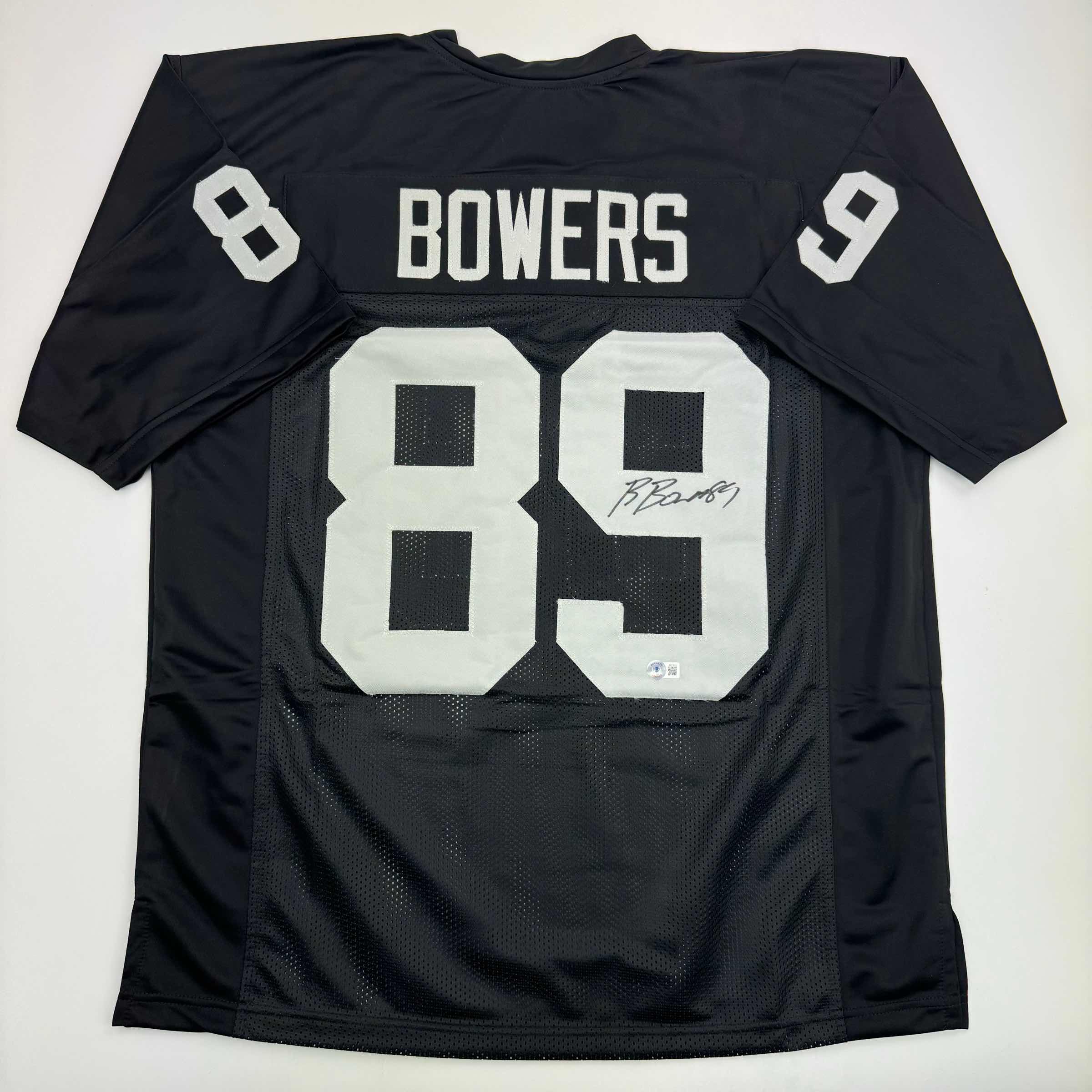 autographed-signed-brock-bowers-las-vegas-oakland-black-football-jersey-beckett-bas-coa
