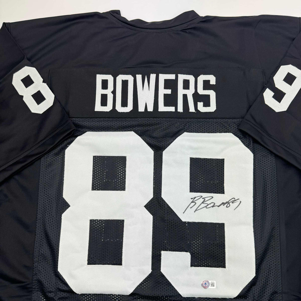 autographed-signed-brock-bowers-las-vegas-oakland-black-football-jersey-beckett-bas-coa