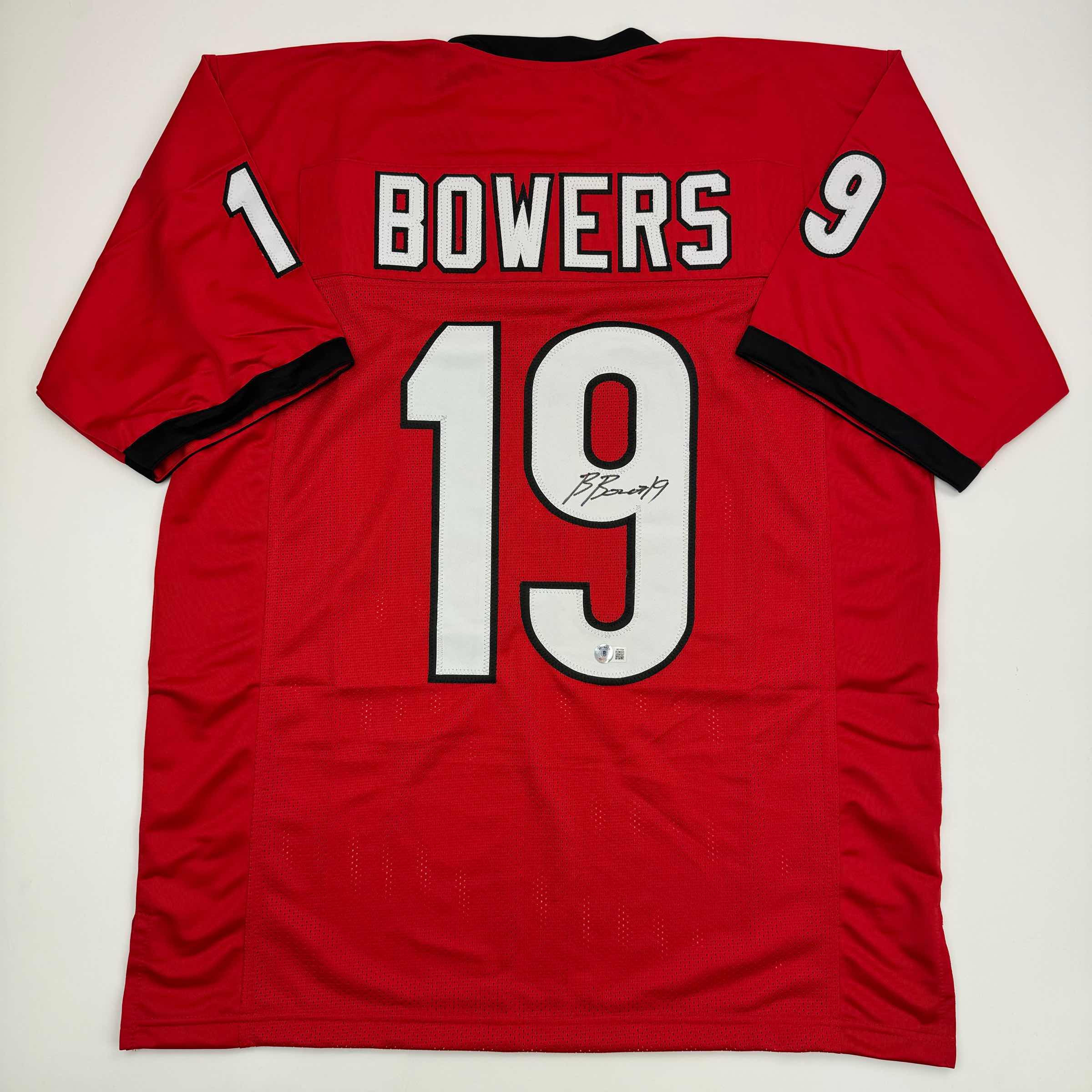 autographed-signed-brock-bowers-georgia-red-college-football-jersey-beckett-bas-coa