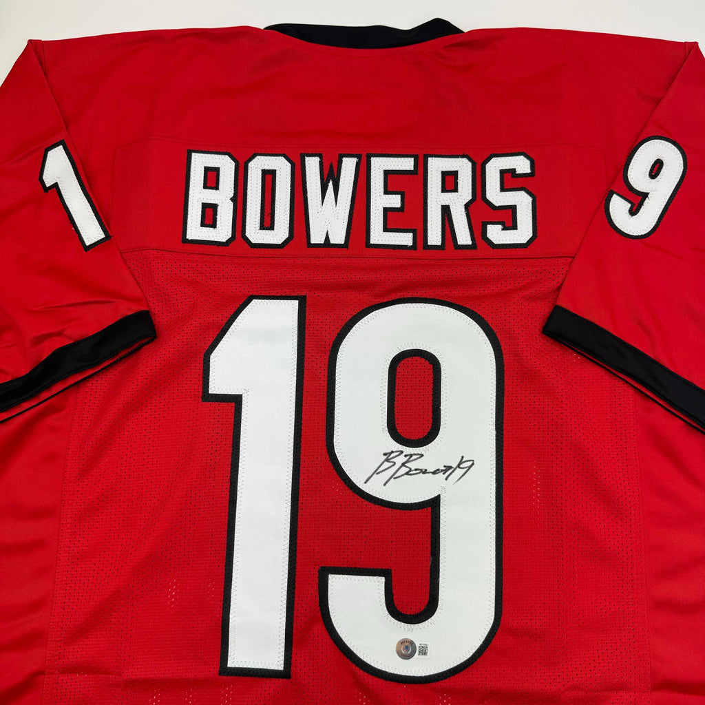autographed-signed-brock-bowers-georgia-red-college-football-jersey-beckett-bas-coa