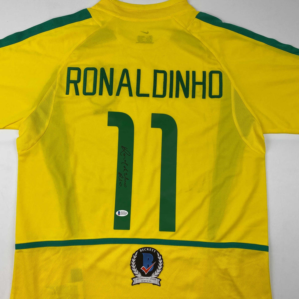autographed-signed-ronaldinho-brazil-yellow-soccer-futbol-jersey-beckett-bas-coa