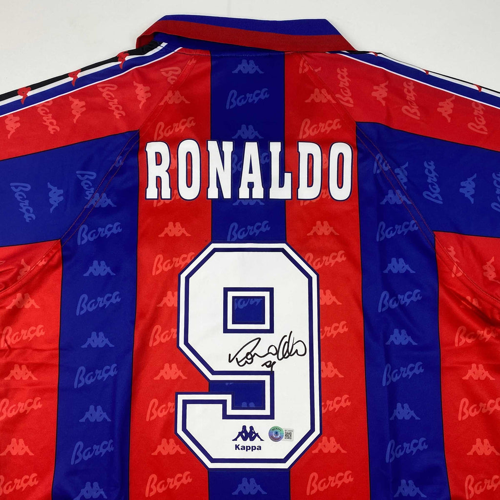 autographed-signed-ronaldo-nazario-fc-barcelona-red-blue-soccer-jersey-beckett-bas-coa