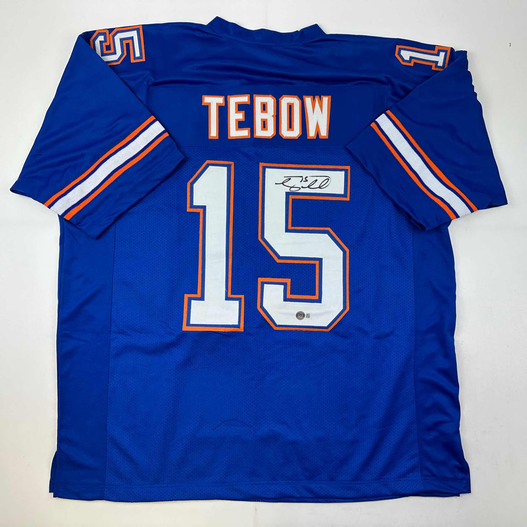 autographed-signed-tim-tebow-florida-blue-college-football-jersey-beckett-bas-coa