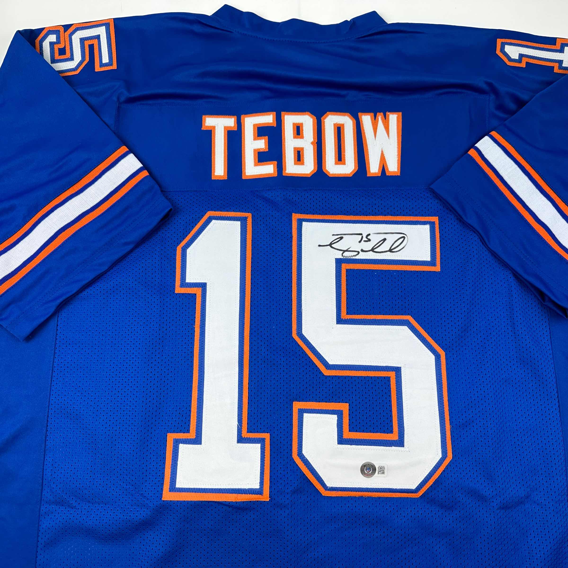 autographed-signed-tim-tebow-florida-blue-college-football-jersey-beckett-bas-coa