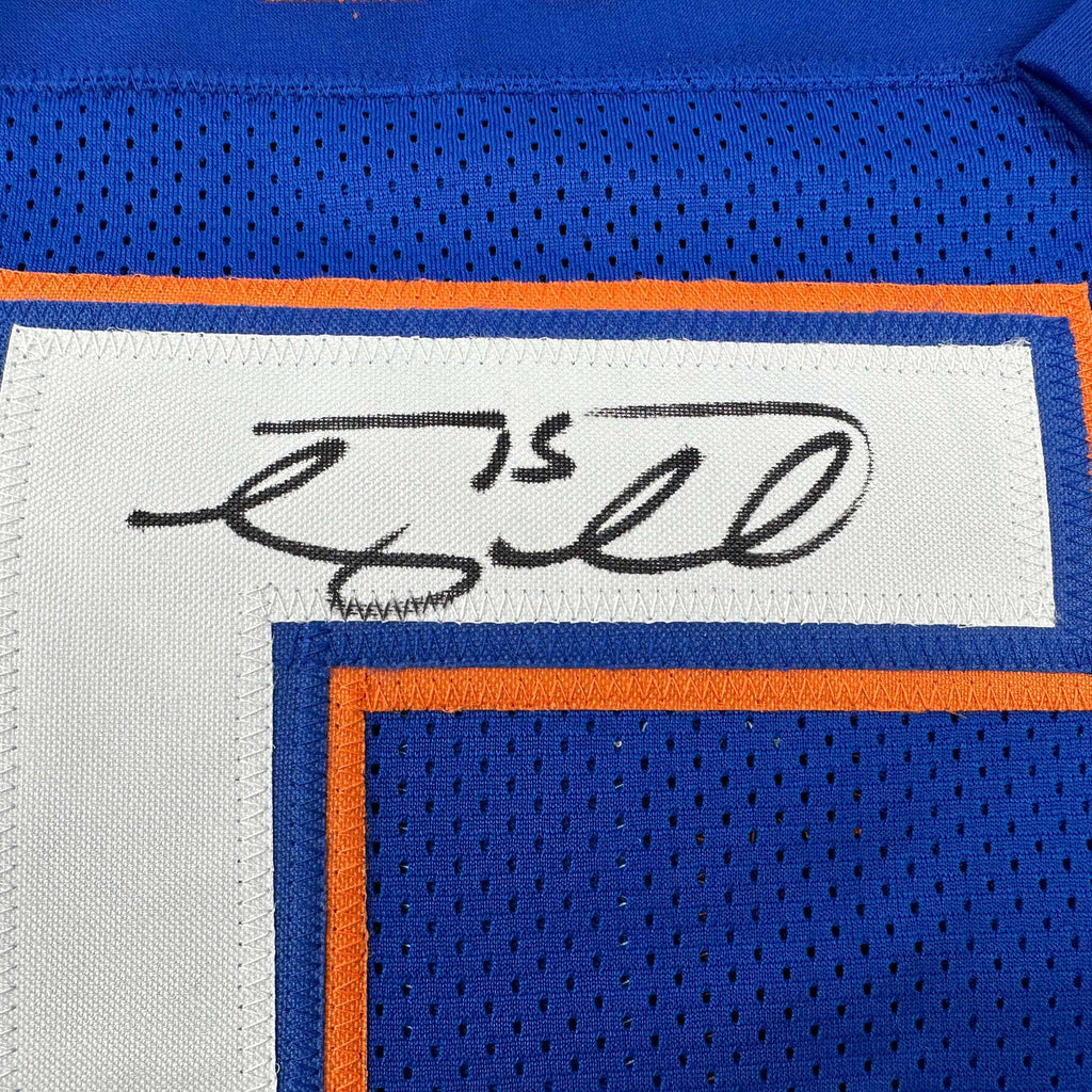 autographed-signed-tim-tebow-florida-blue-college-football-jersey-beckett-bas-coa