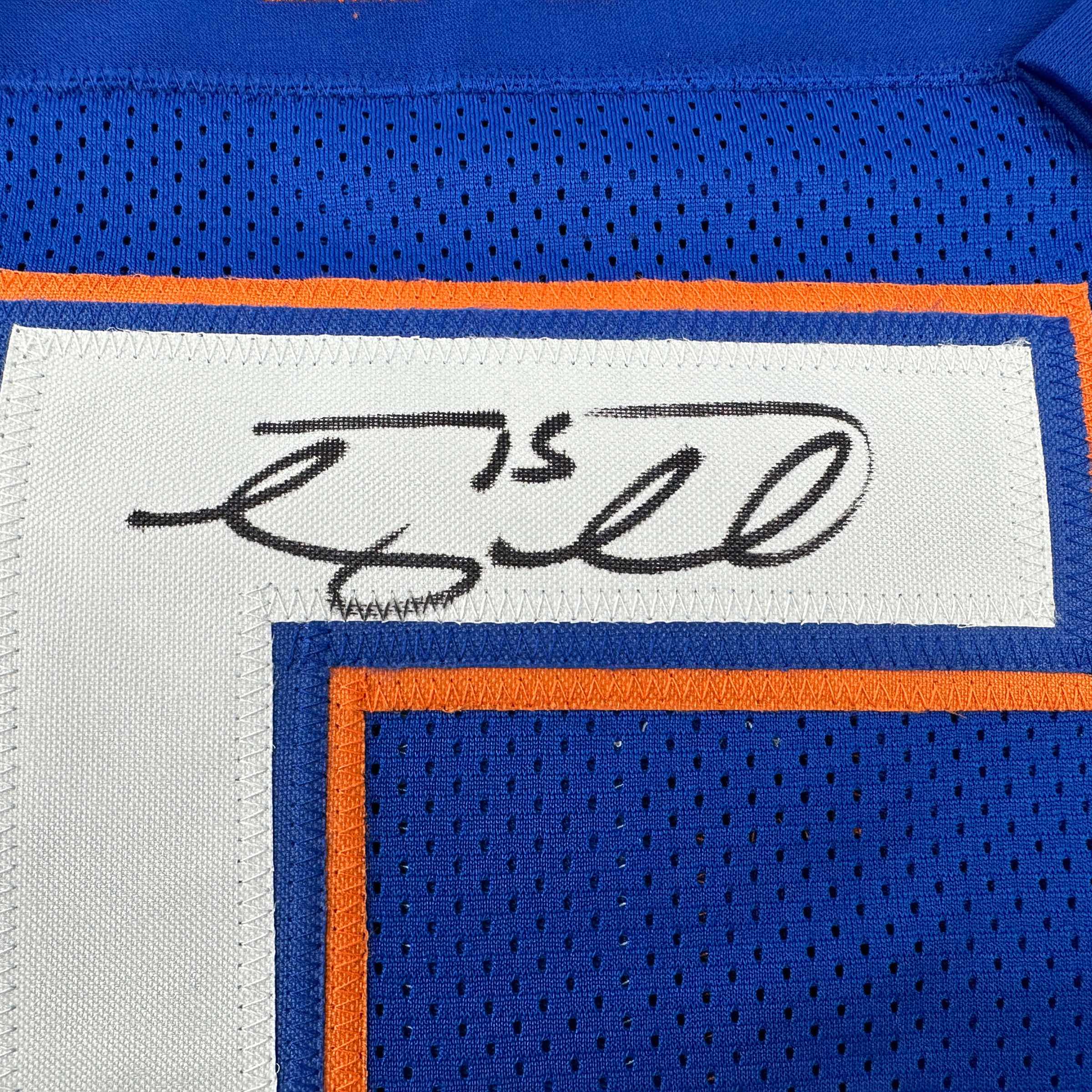 autographed-signed-tim-tebow-florida-blue-college-football-jersey-beckett-bas-coa