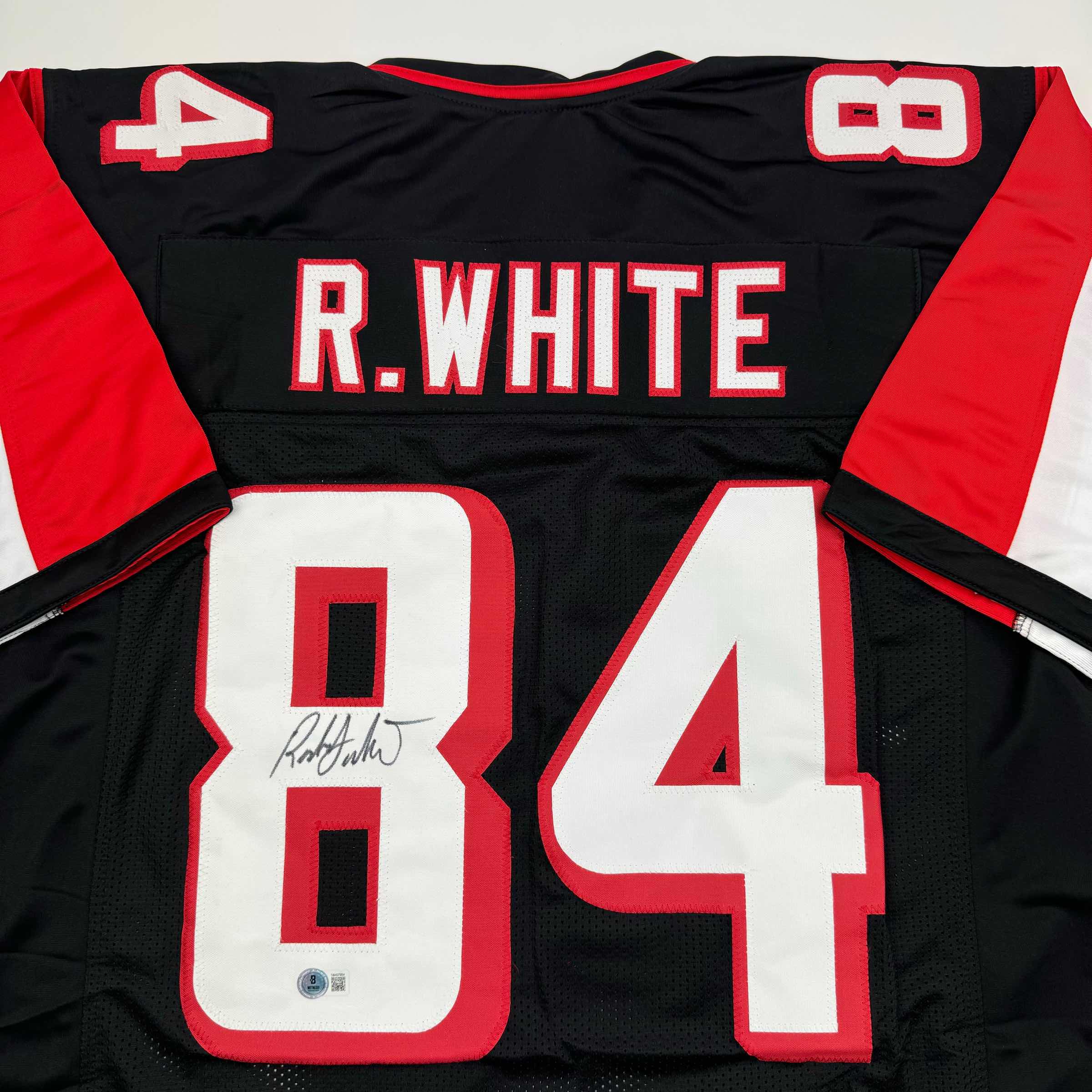 autographed-signed-roddy-white-atlanta-black-football-jersey-beckett-bas-coa
