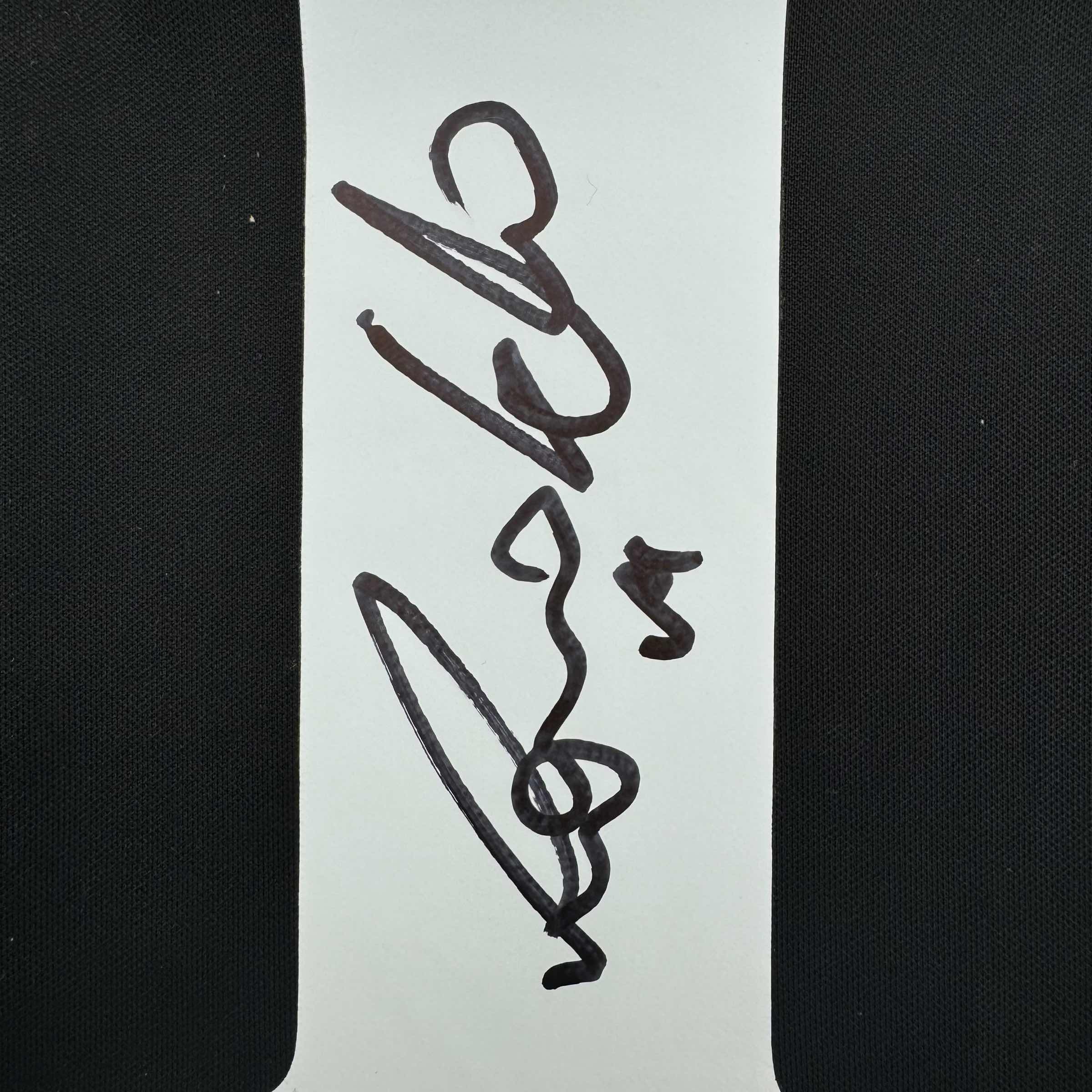 autographed-signed-ronaldo-nazario-real-madrid-black-soccer-jersey-beckett-bas-coa